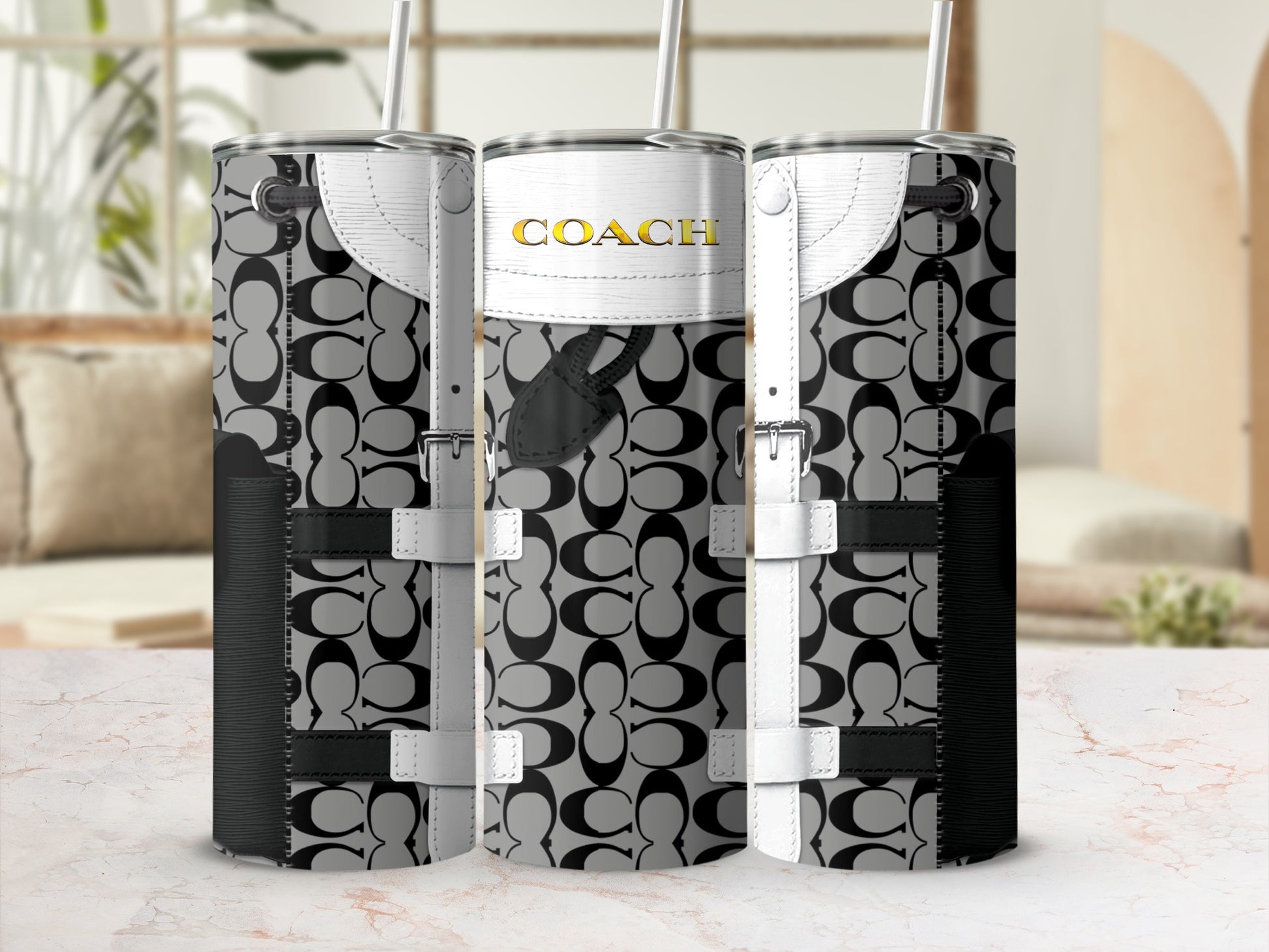 Three tumblers with Coach C logo pattern and white strap accents.