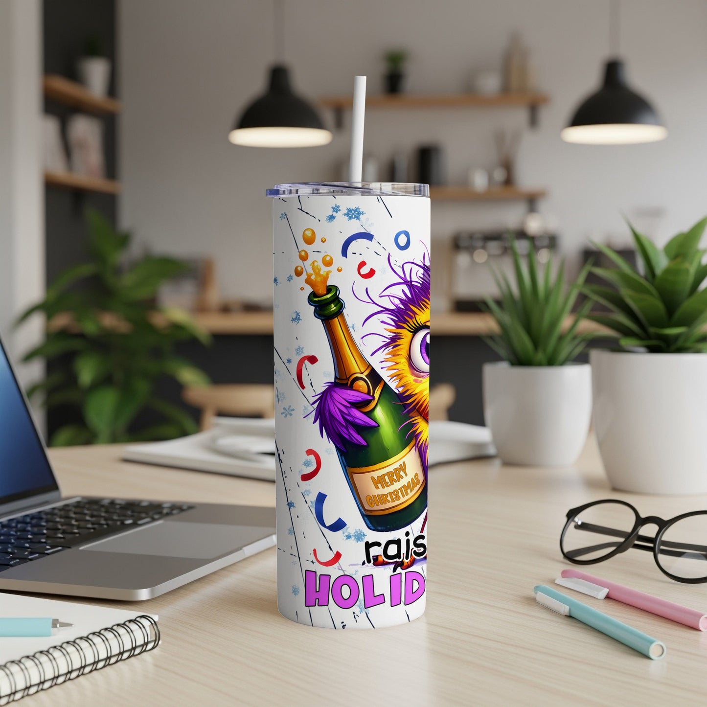 Monster with champagne and "Merry Christmas" label on a holiday tumbler.
