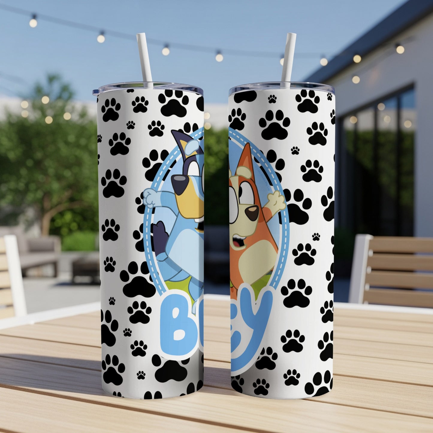 Two tumblers with Bluey and Bingo characters on paw print background.