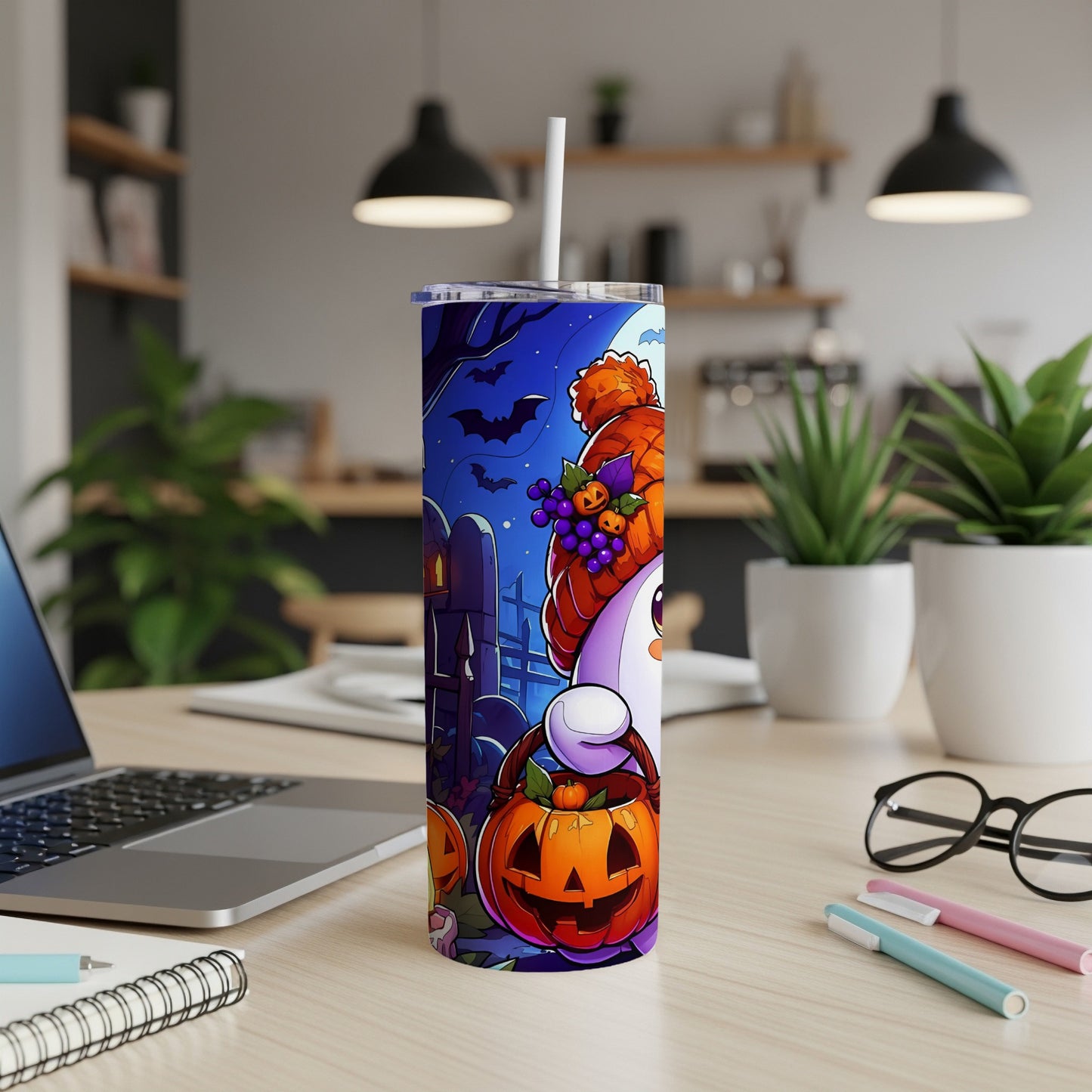 Tumbler with cartoon Halloween ghost holding a pumpkin bucket against a spooky night scene.