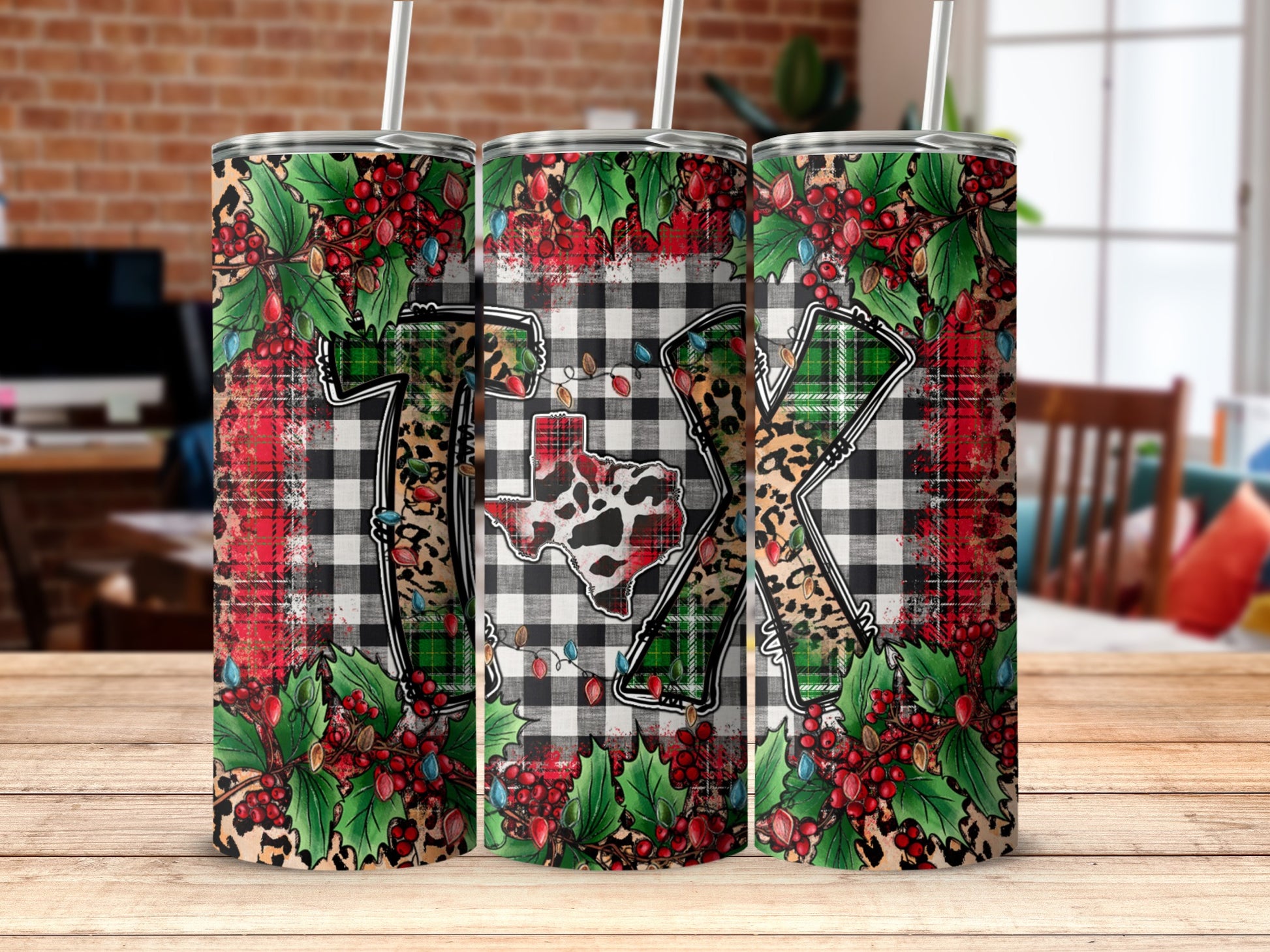Texas-shaped outline on buffalo plaid tumbler with holly berries and lights.