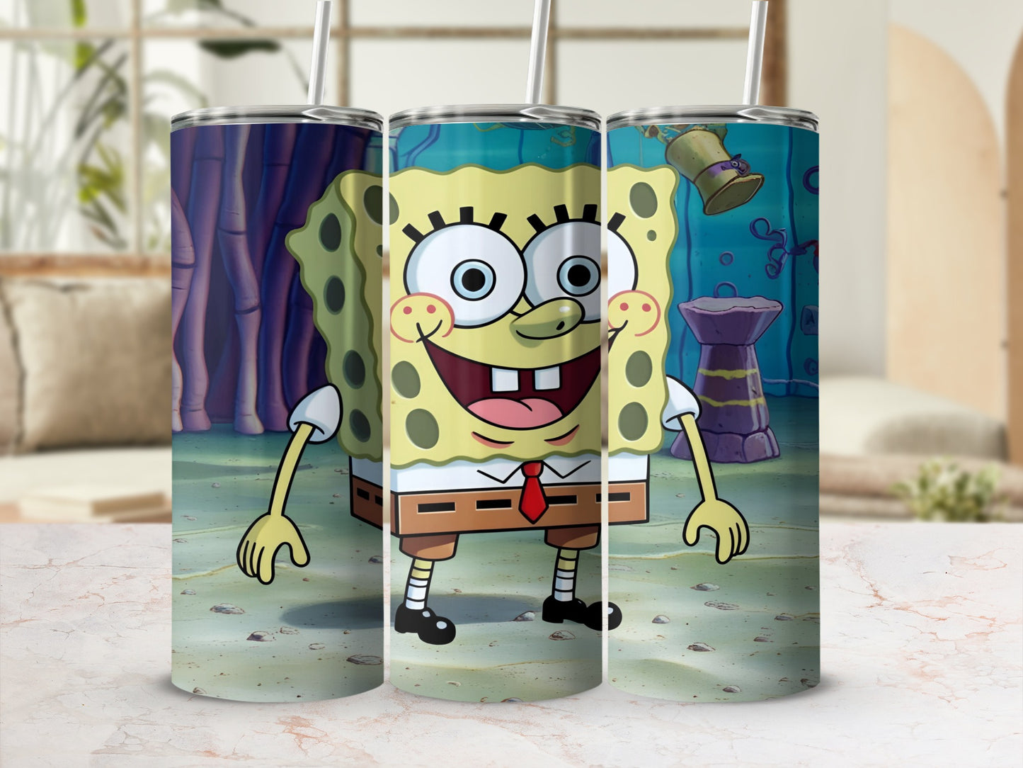 SpongeBob SquarePants tumbler with a white straw and red tie.