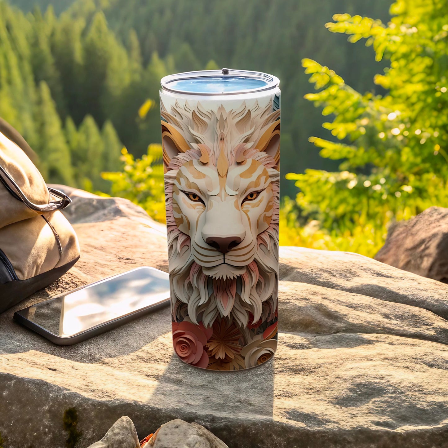 Tumbler with a detailed lion's head design featuring floral accents.