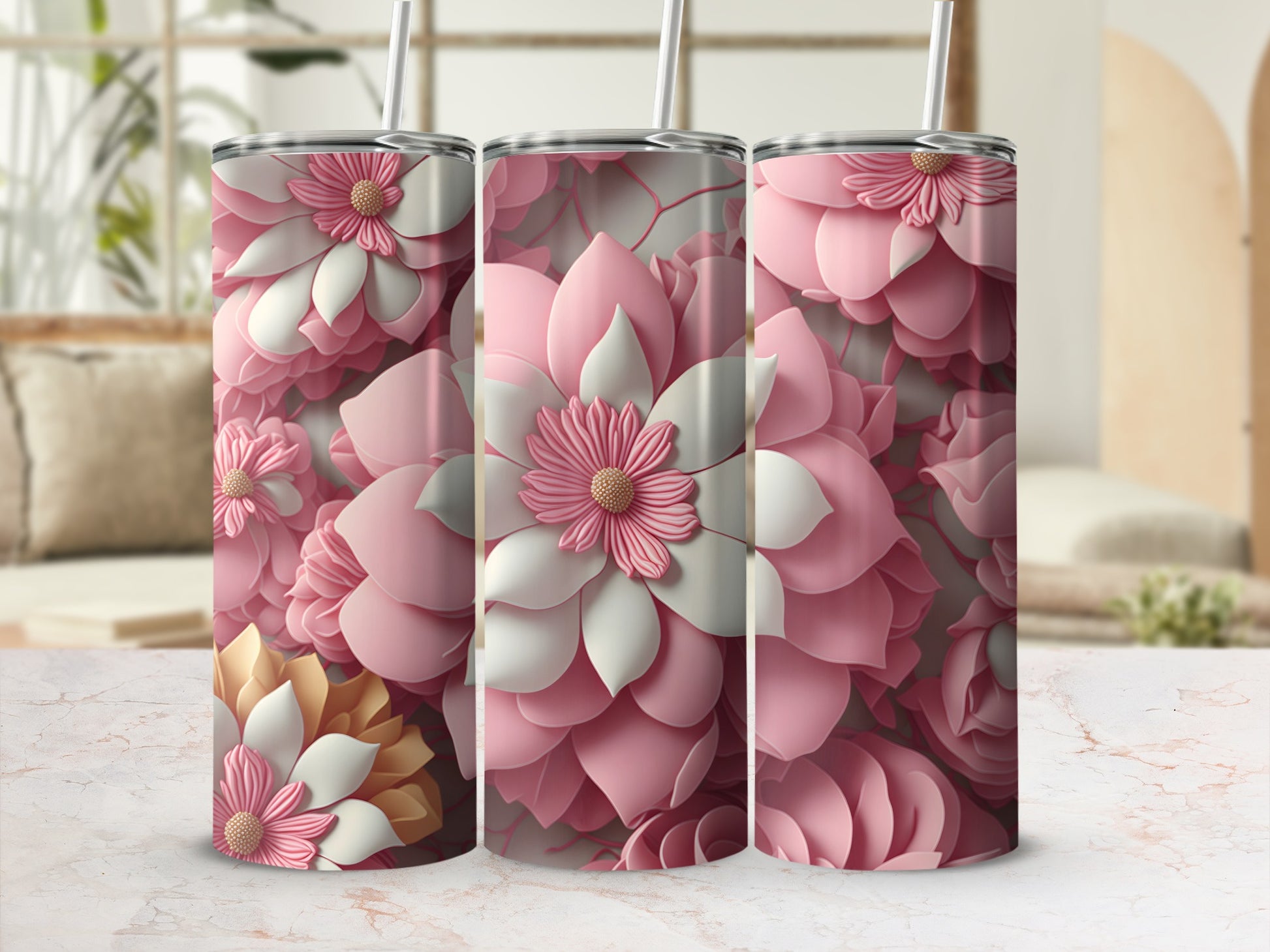 Three tumblers with a pink and white floral pattern.