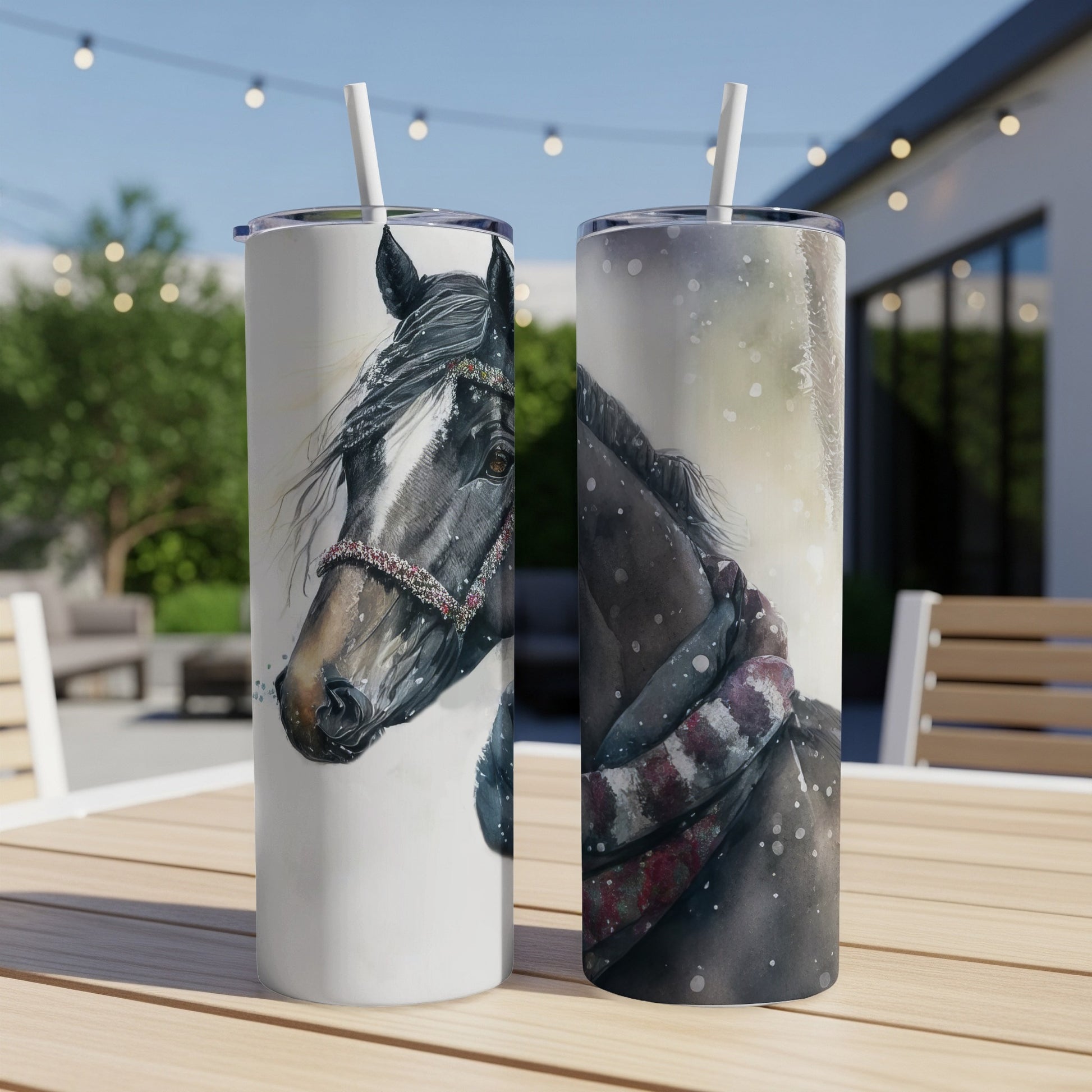 Two tumblers featuring a horse illustration with snow and a festive scarf.