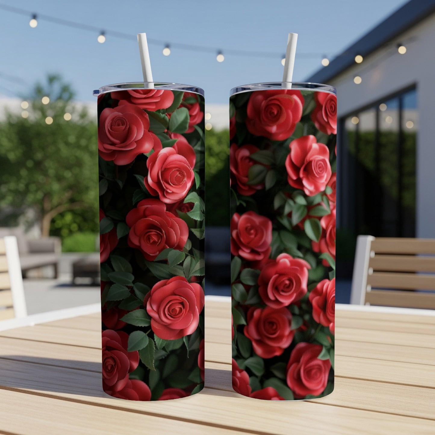 Two tumblers with a repeating pattern of red roses and green leaves.