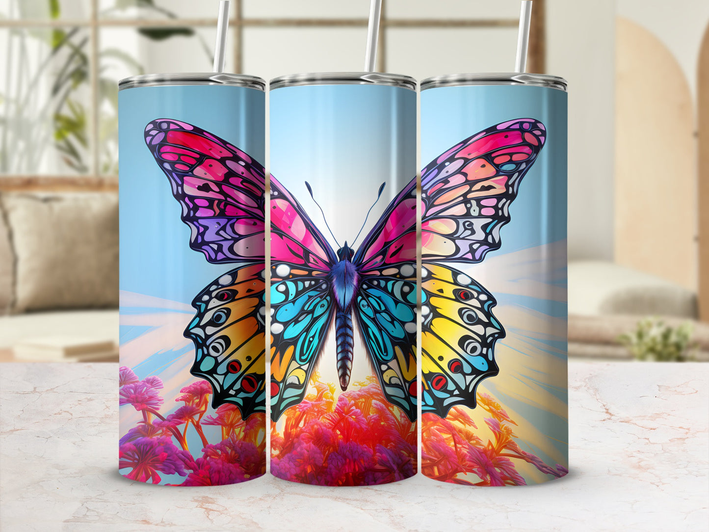 Colorful butterfly design on a blue gradient tumbler with straw.