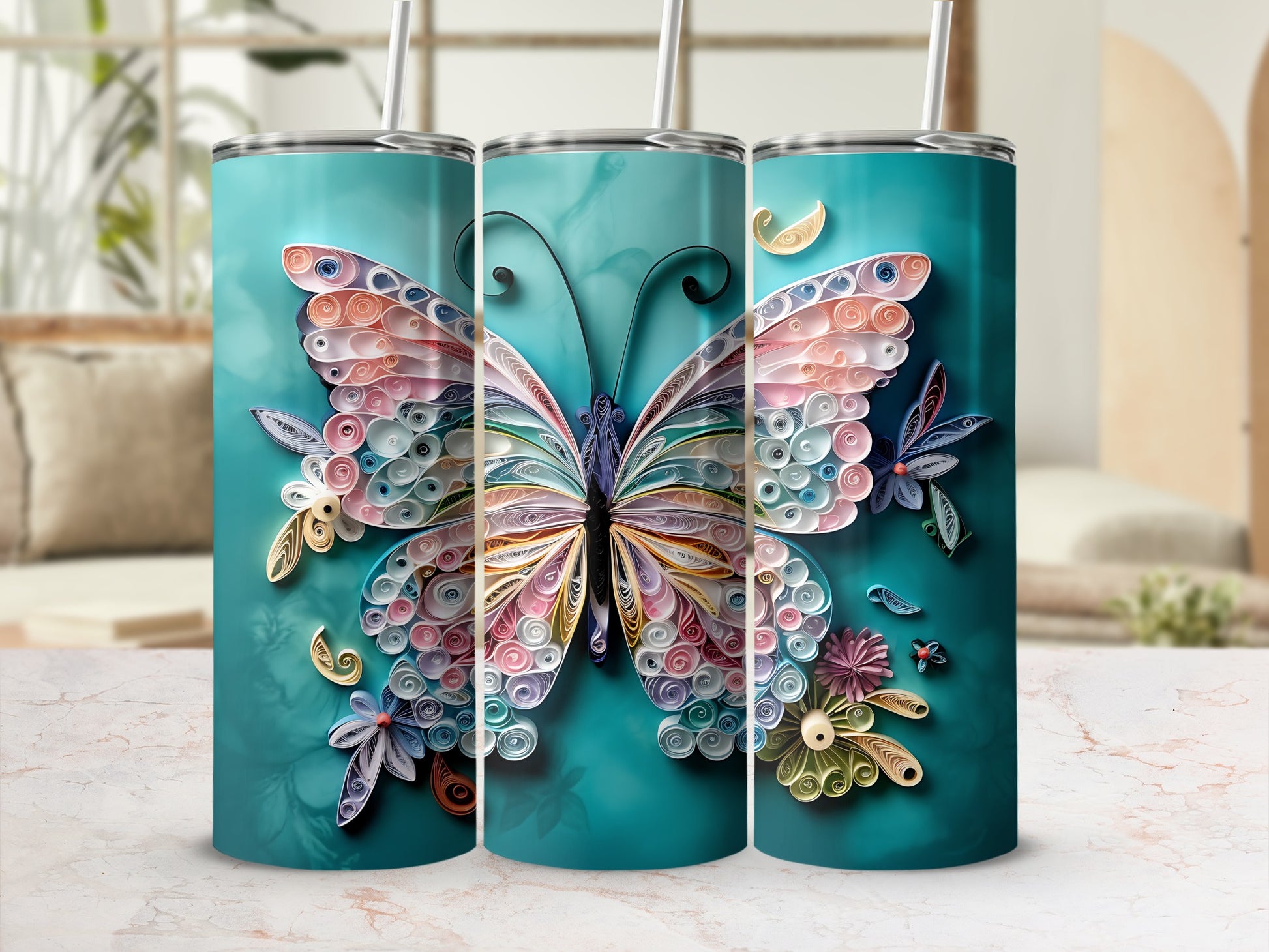 Three teal tumblers featuring a colorful quilled paper butterfly and flowers pattern.