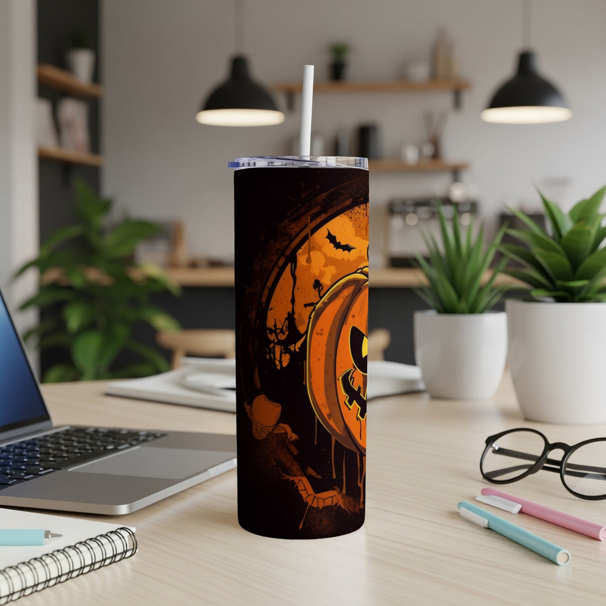 Tall Halloween tumbler with a dripping jack-o'-lantern and bats design.