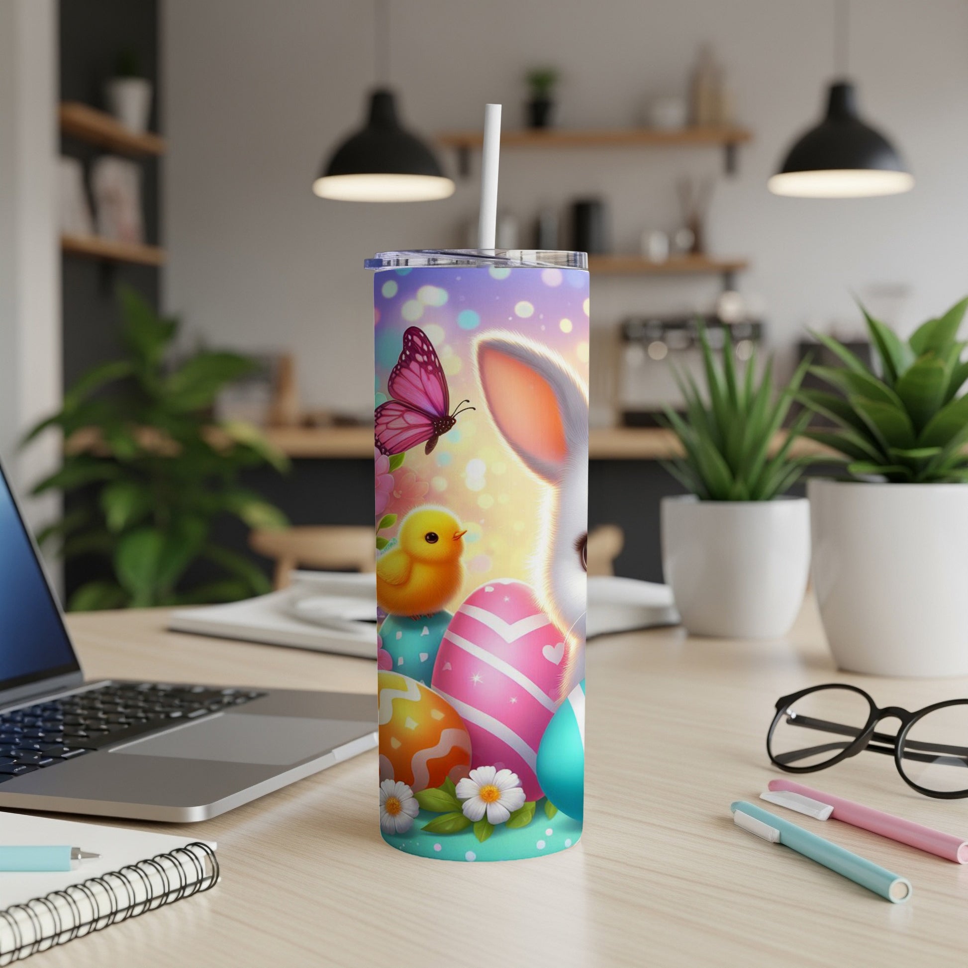 Easter bunny, chicks, and eggs on a colorful tumbler with a straw.