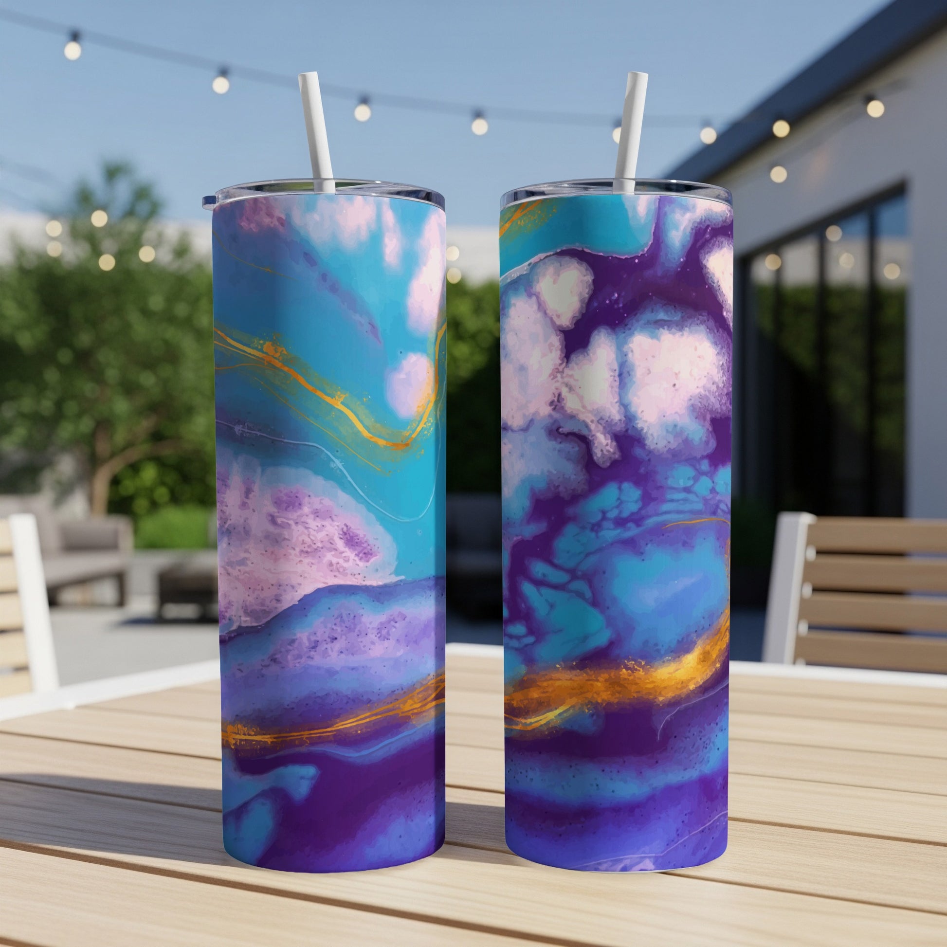 Two tumblers with a purple, blue, and gold abstract fluid art design.