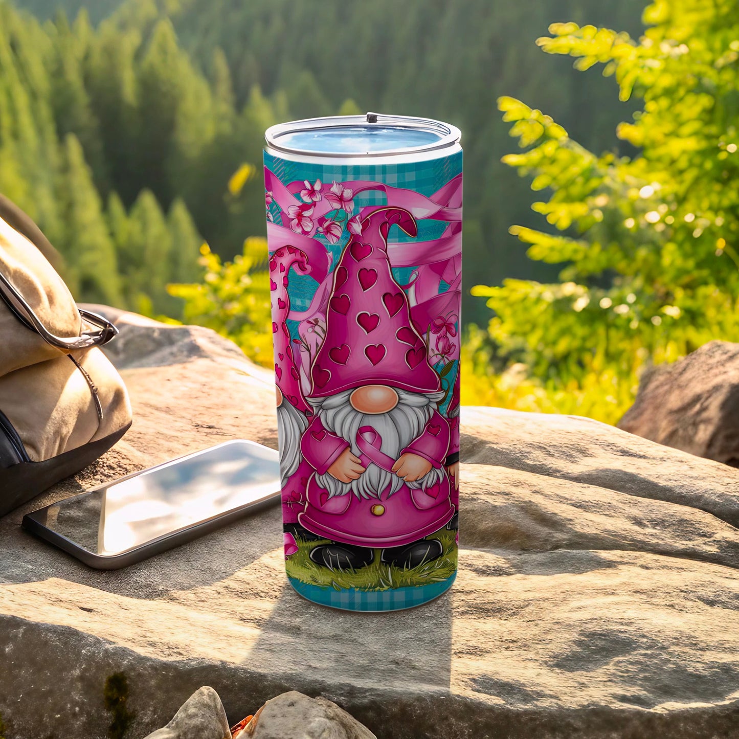 Pink gnome tumbler with heart patterns, set against a forest background.