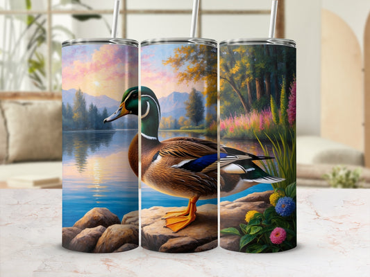 Triptych of tumblers featuring a detailed painting of a duck by a rocky lake with colorful flowers.