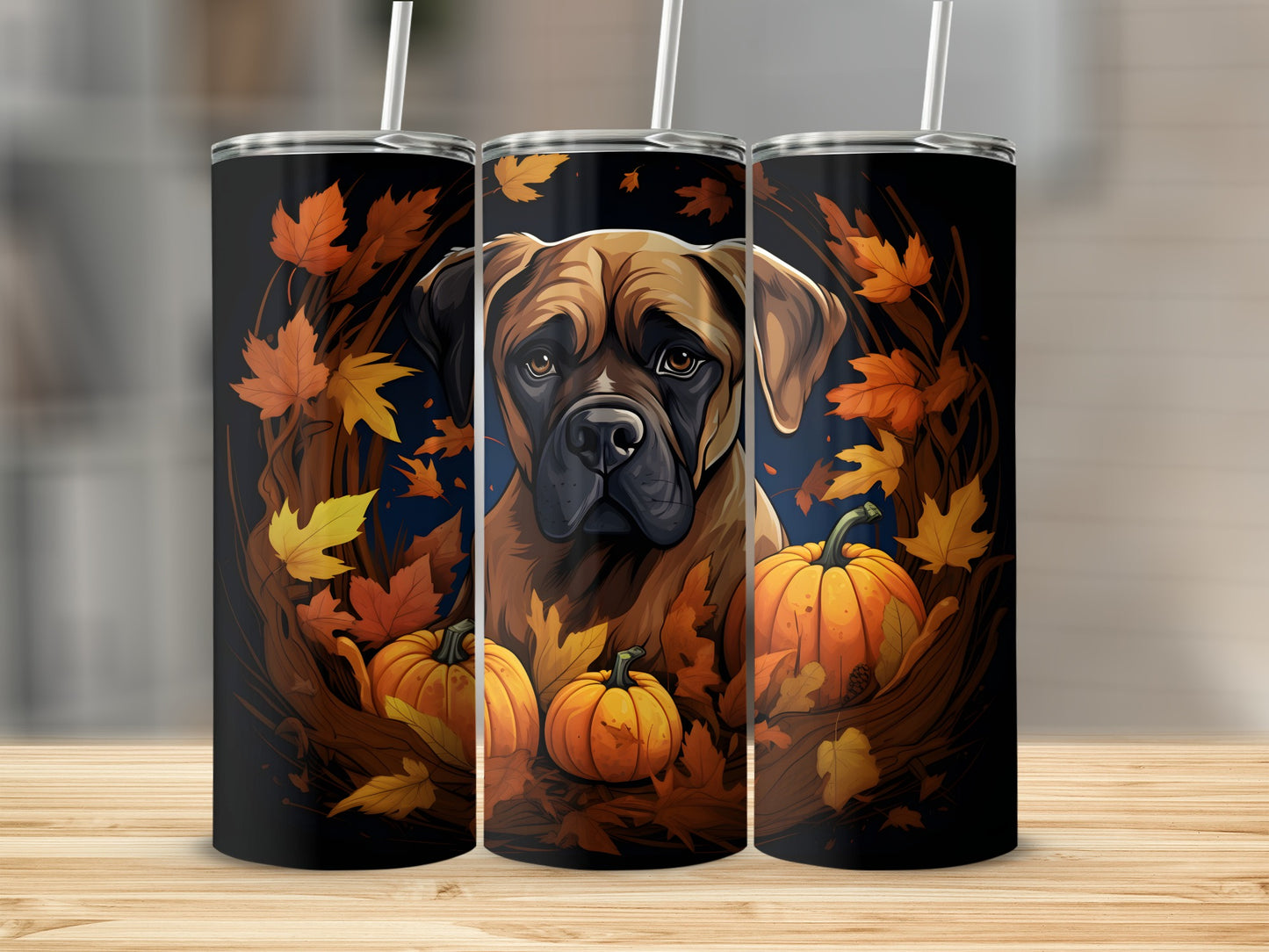 Mastiff dog surrounded by autumn leaves and pumpkins on a black tumbler.