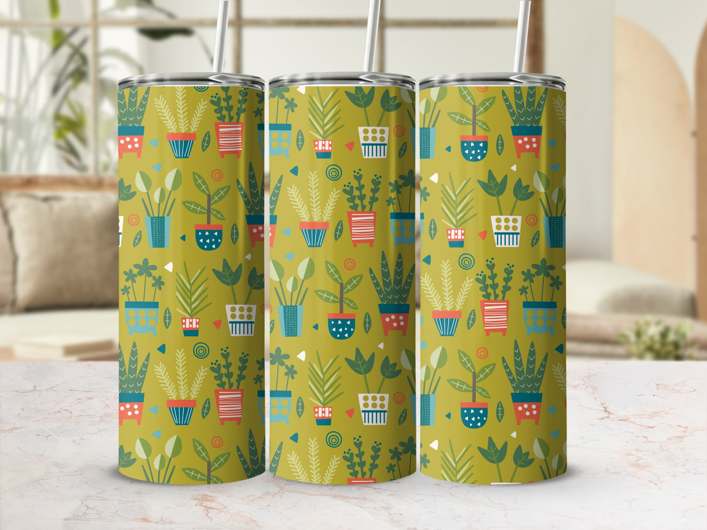 Three tumblers with a playful potted plant pattern on a yellow-green background.