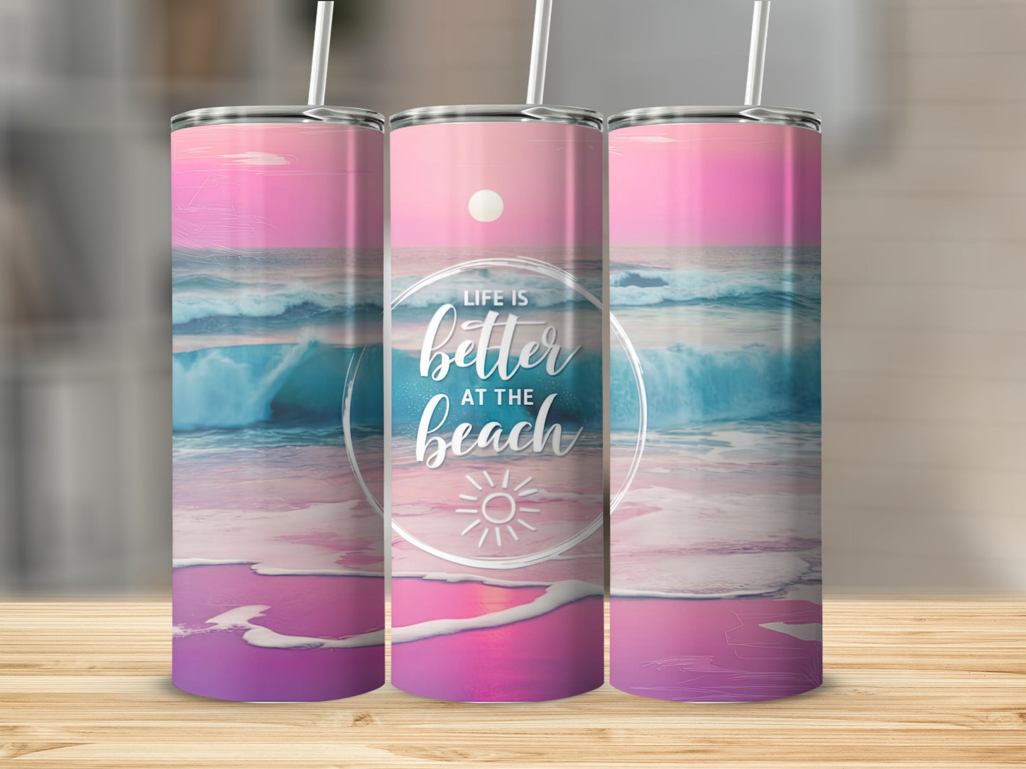 Three tumblers with beach sunset scene and "Life is better at the beach" text.