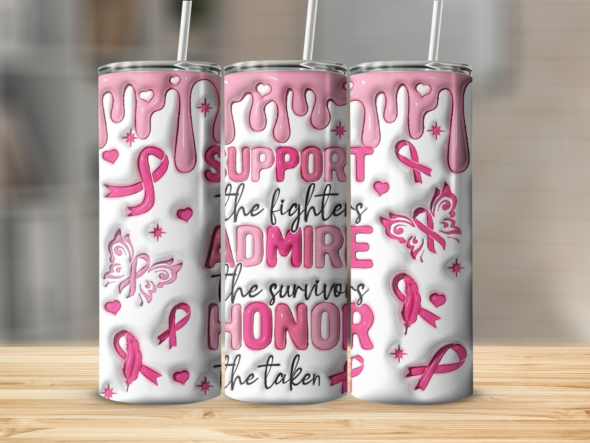 Three pink breast cancer awareness tumblers with motivational text and symbols.