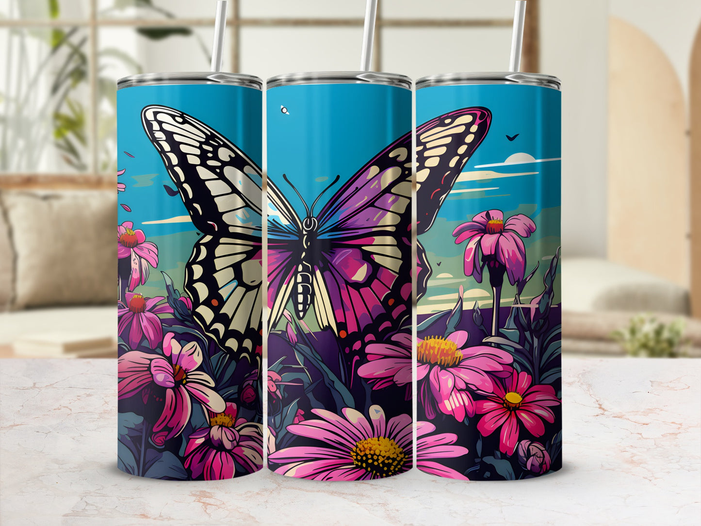 Three tumblers with purple and pink flowers and a butterfly design.