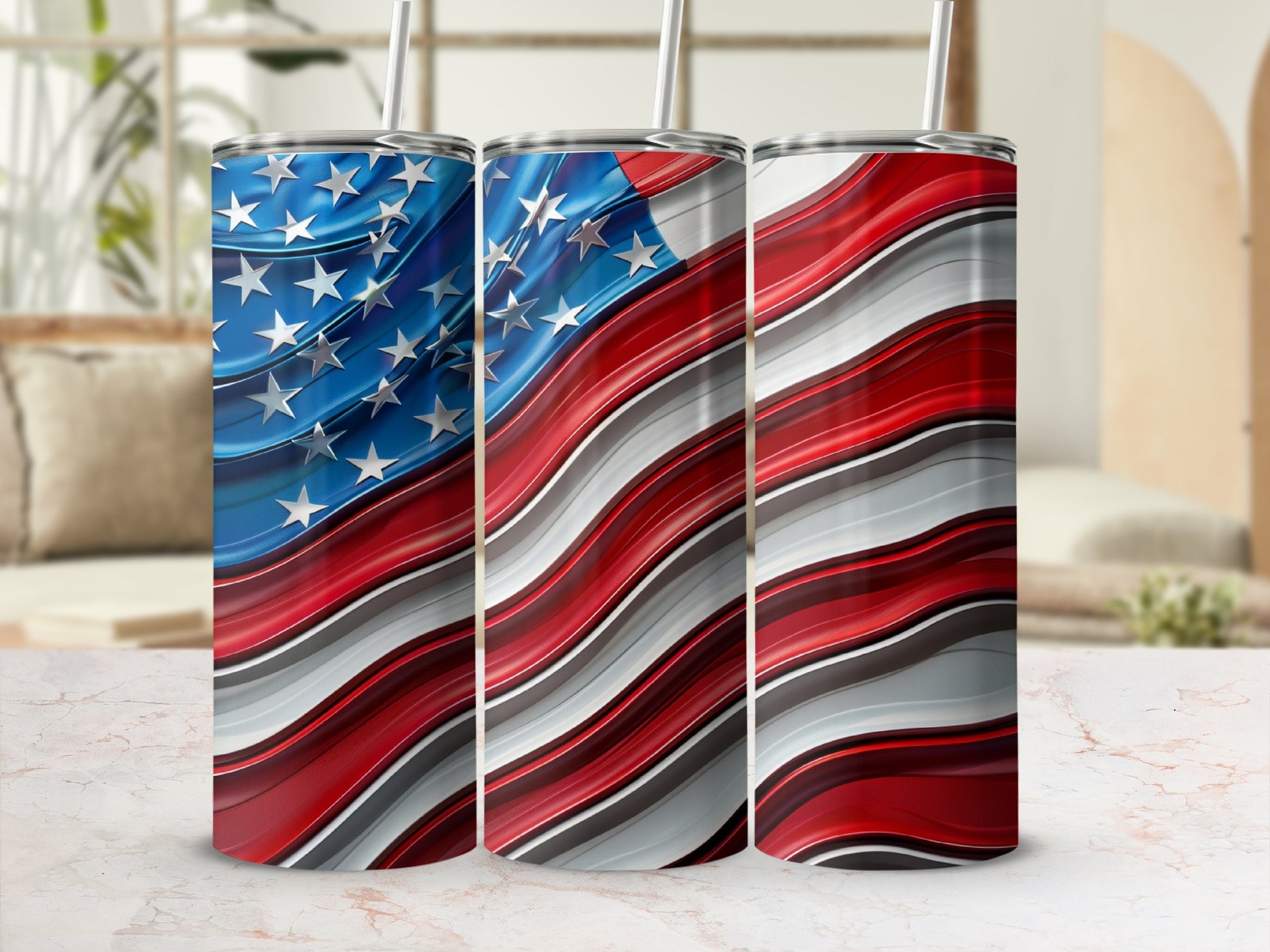 Three tumblers with a wavy American flag design and straws.