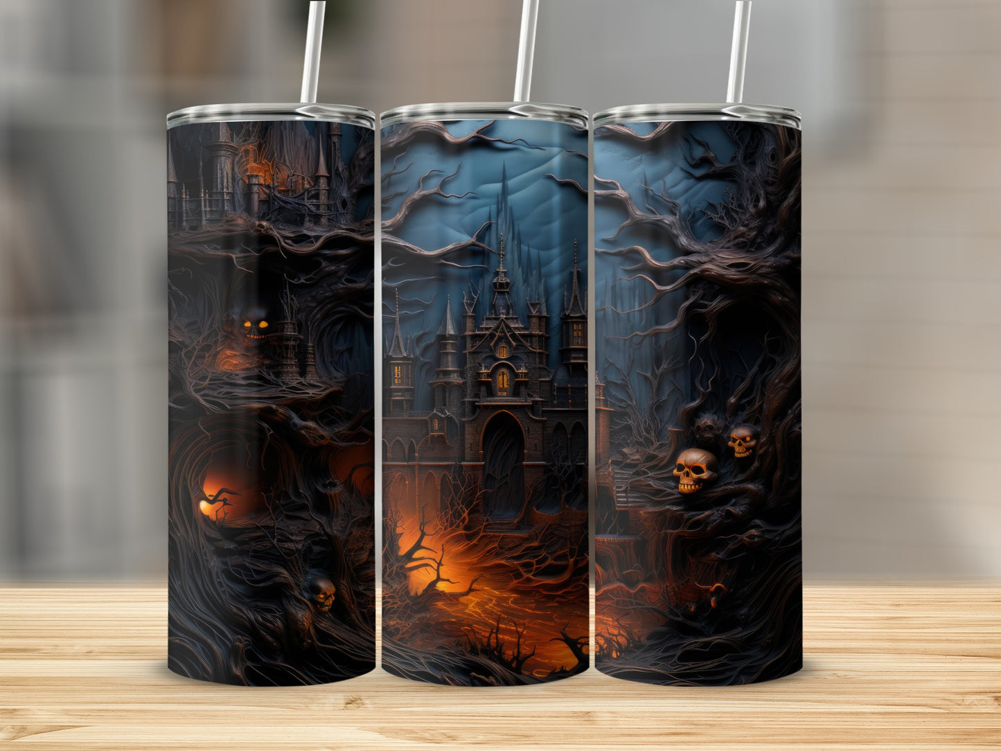 Three tumblers with a dark castle, eerie trees, and skulls design.