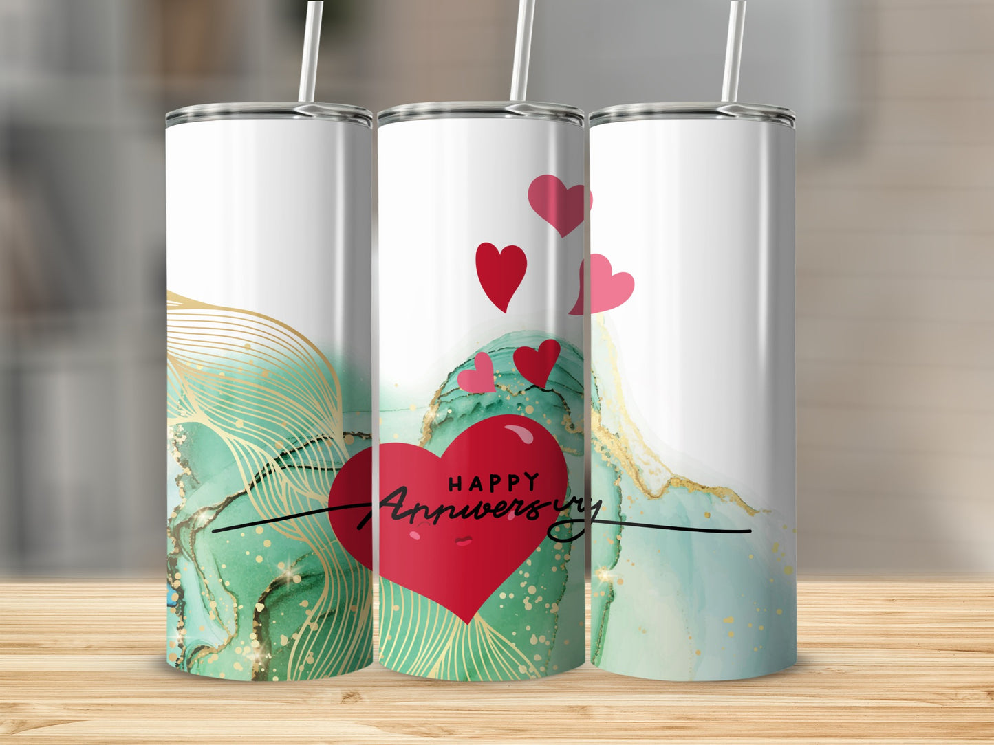 Three tumblers with marble and heart designs, reading "Happy Anniversary".