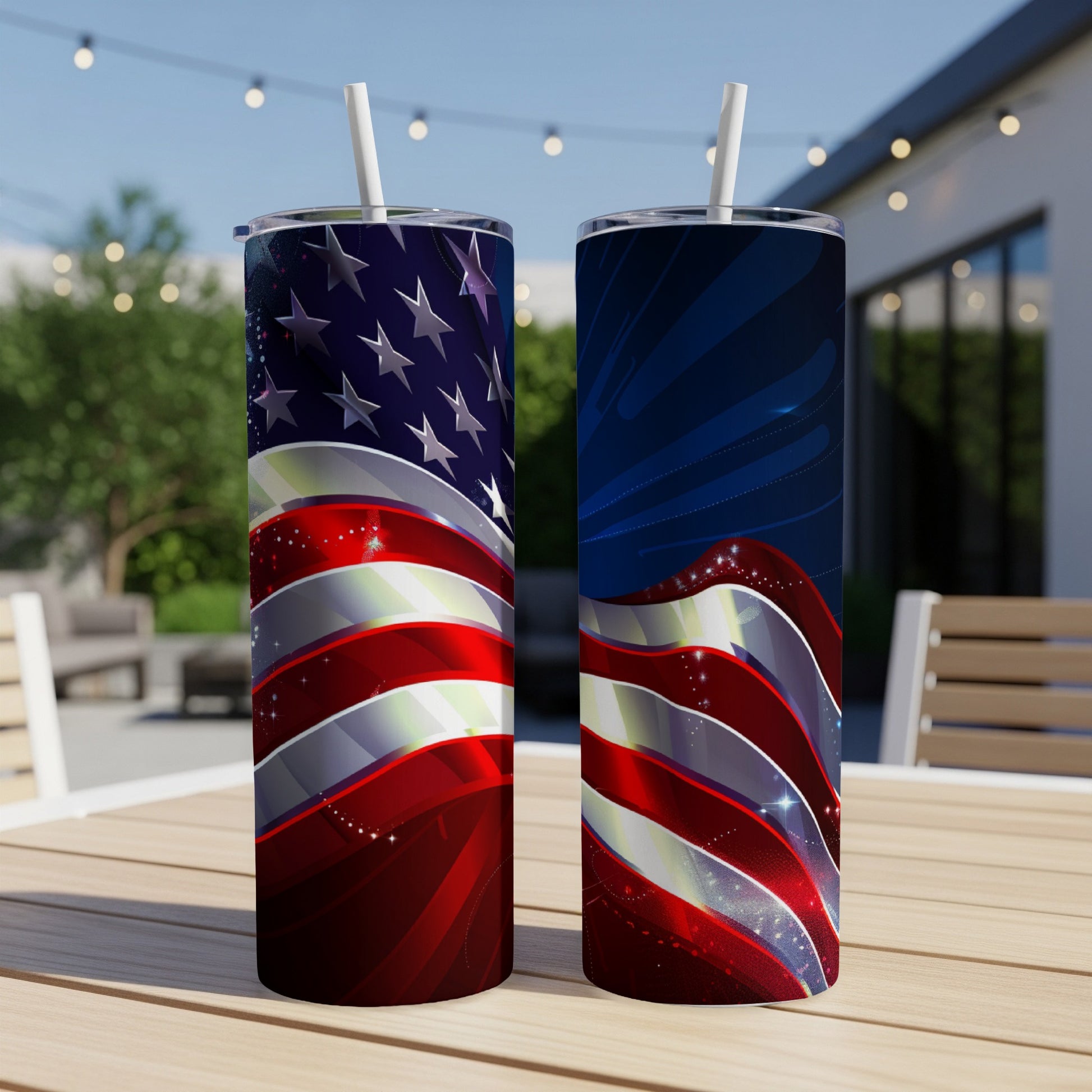 Two tumblers with American flag design on a patio table.