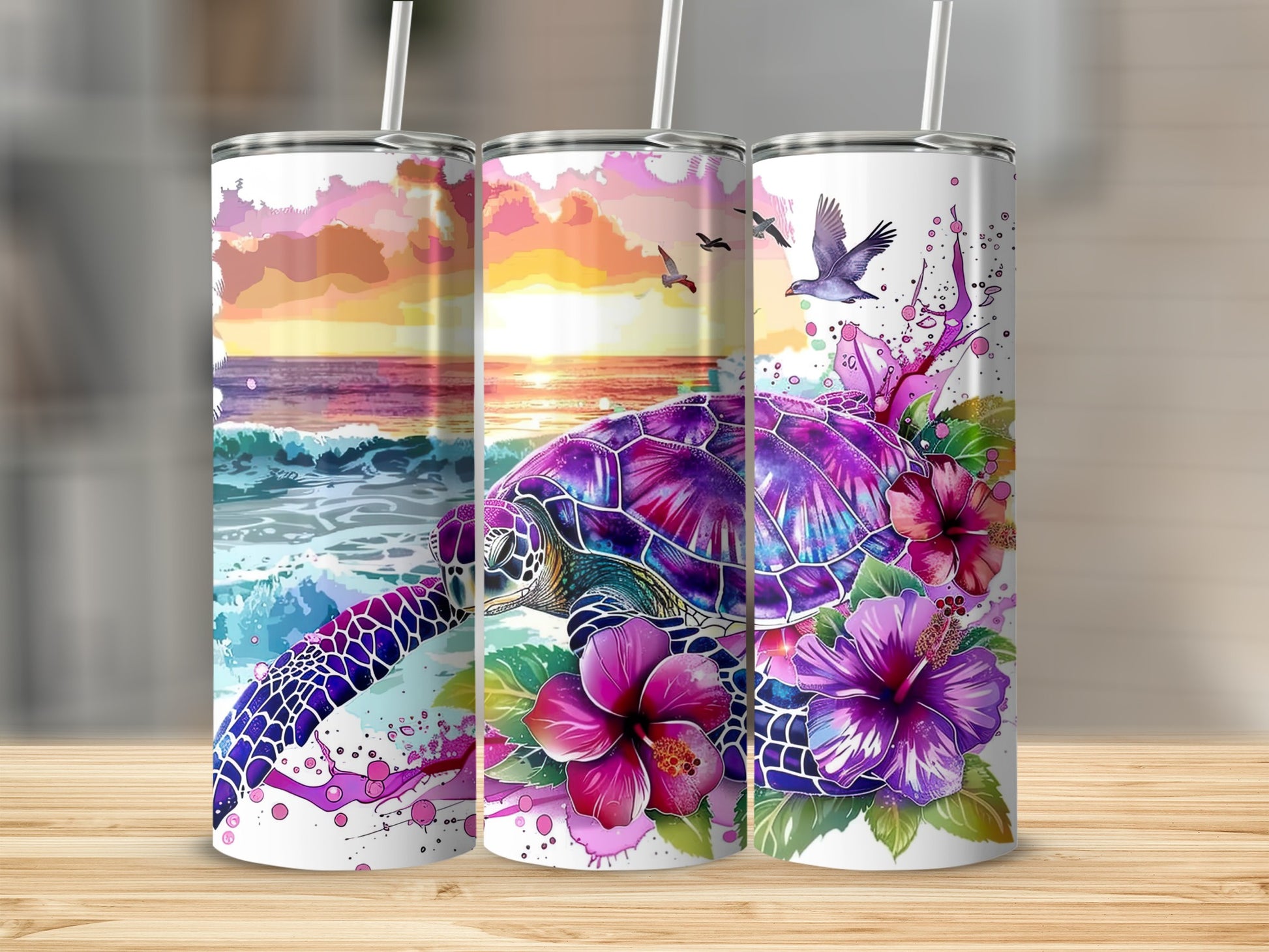 Three tumblers with colorful sea turtle and hibiscus floral designs.