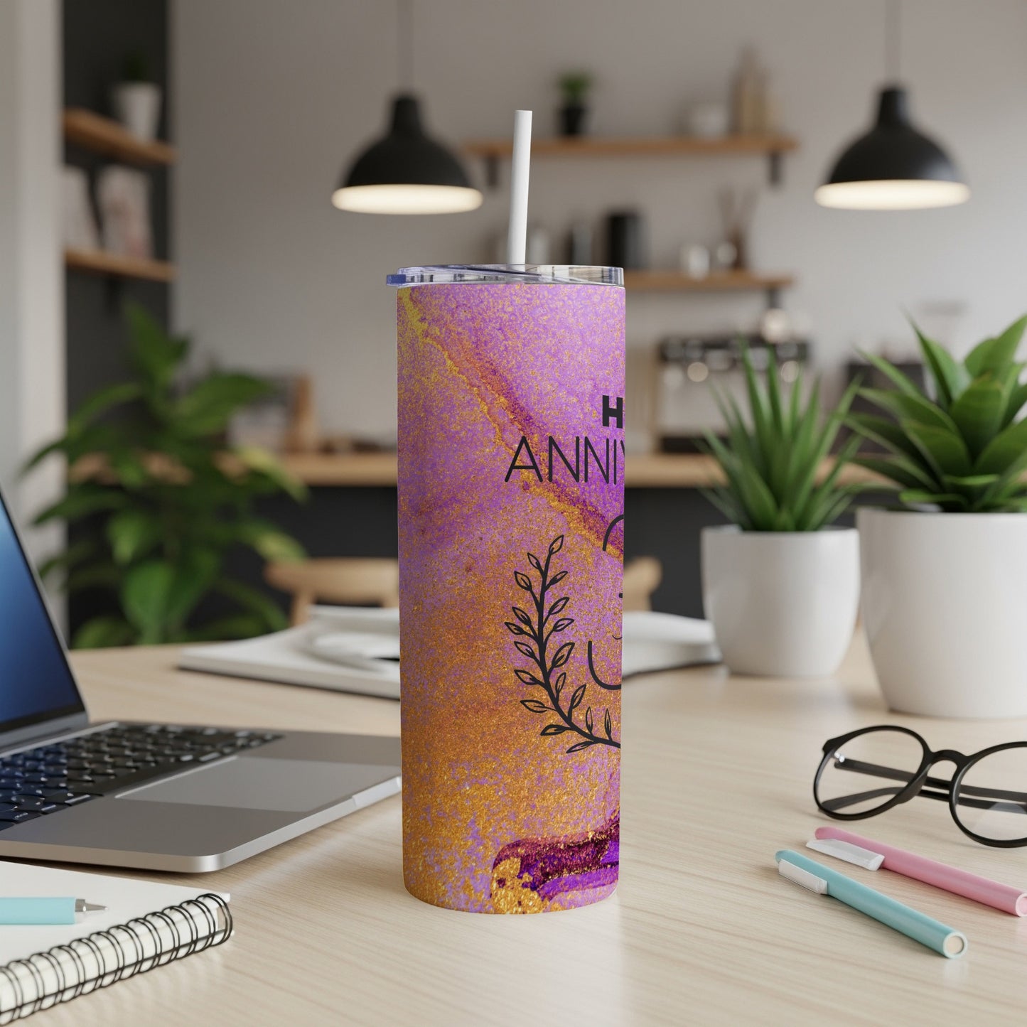 Purple and gold marbled tumbler with "Happy Anniversary" text.