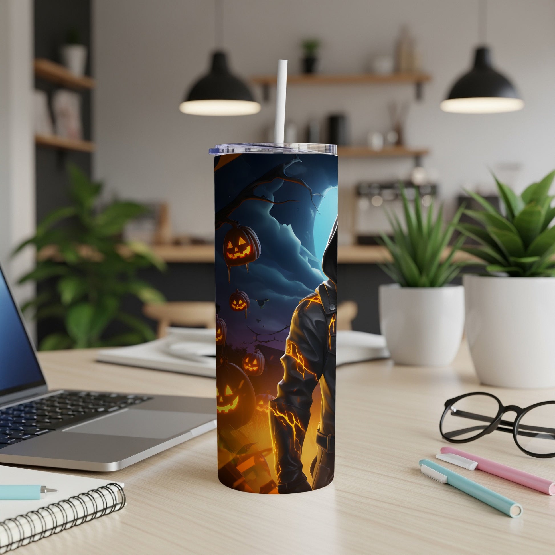 Halloween tumbler with a glowing figure and jack-o'-lanterns under a full moon.