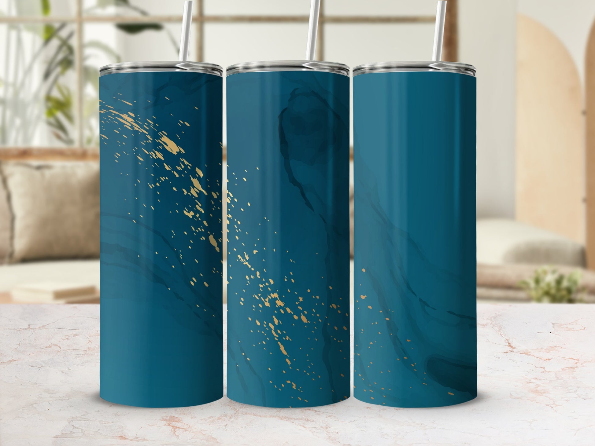 Three teal tumblers with gold splatter design.