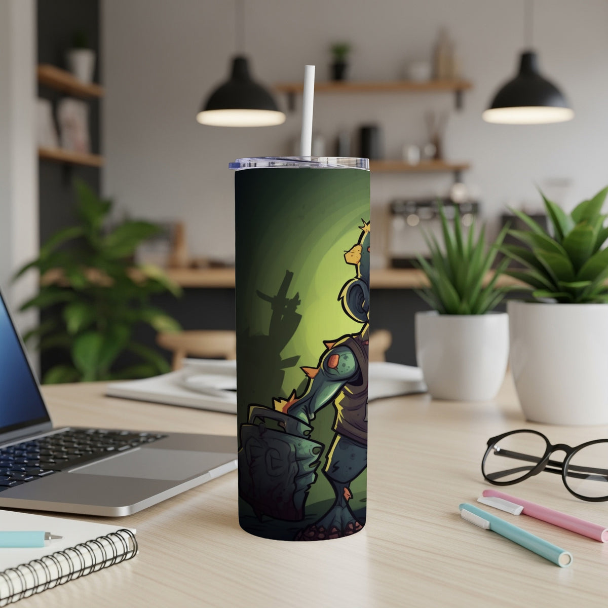 Green tumbler with cartoon zombie character holding a tombstone-shaped bag.