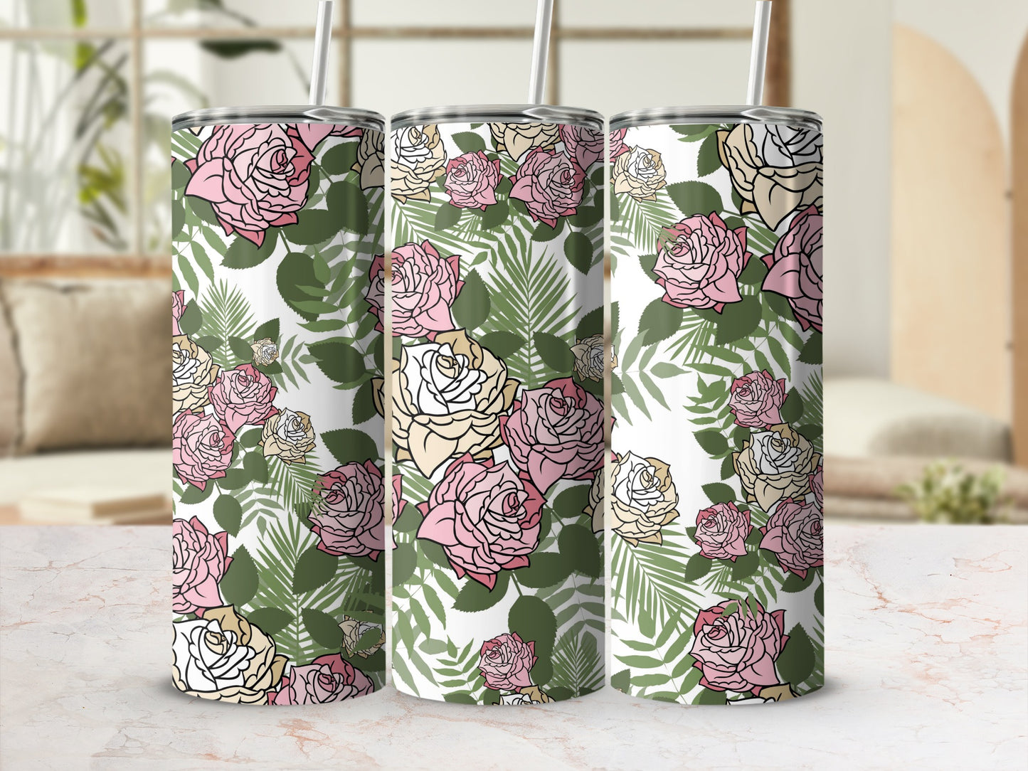 Three tumblers with a pink, yellow, and white rose and green leaf pattern.