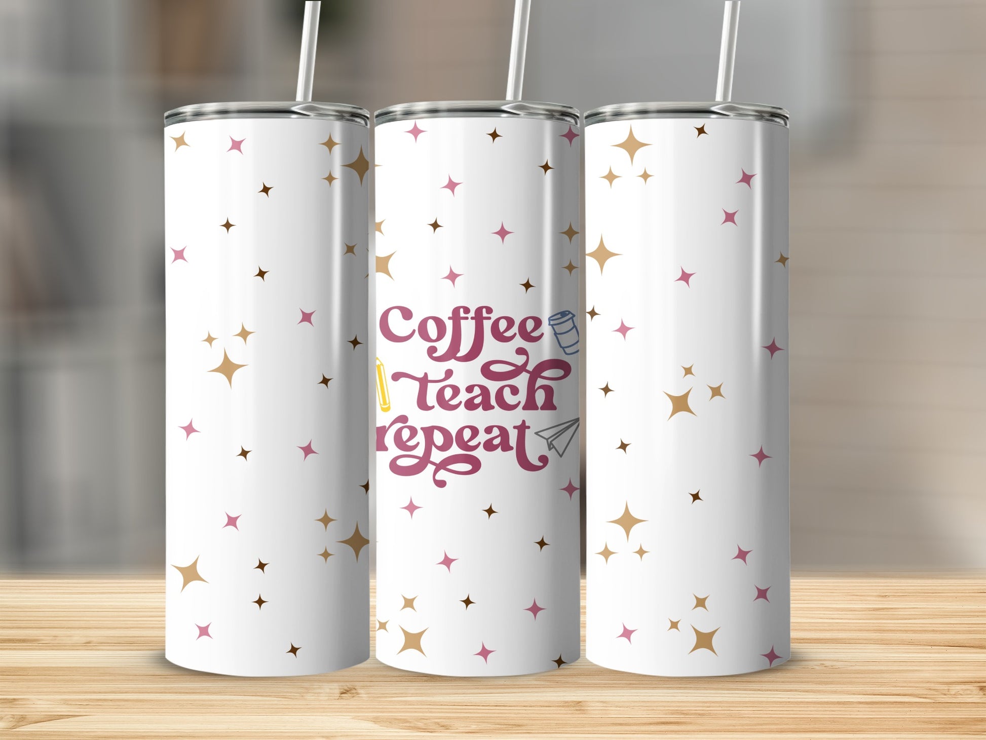 White tumbler with scattered stars, reads "Coffee Teach Repeat" in colorful text.