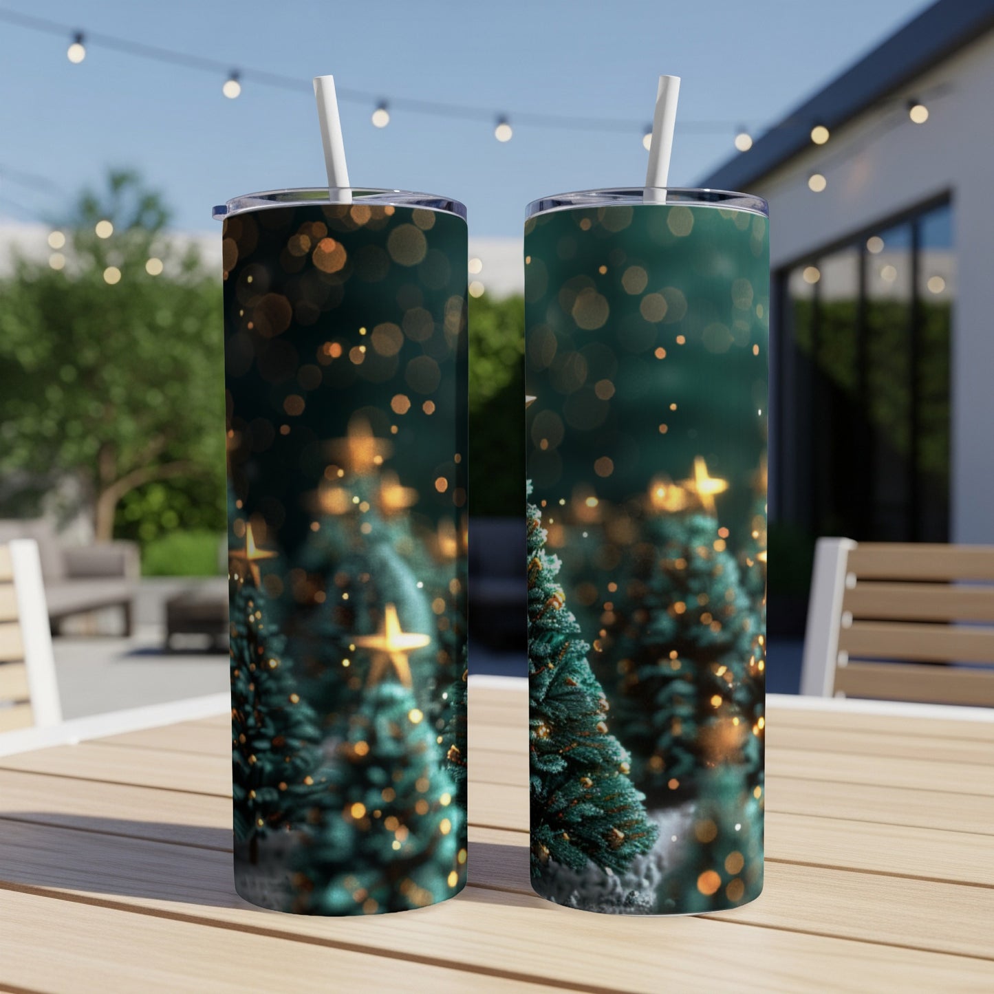 Two tumblers with a dark green Christmas tree and bokeh lights design.