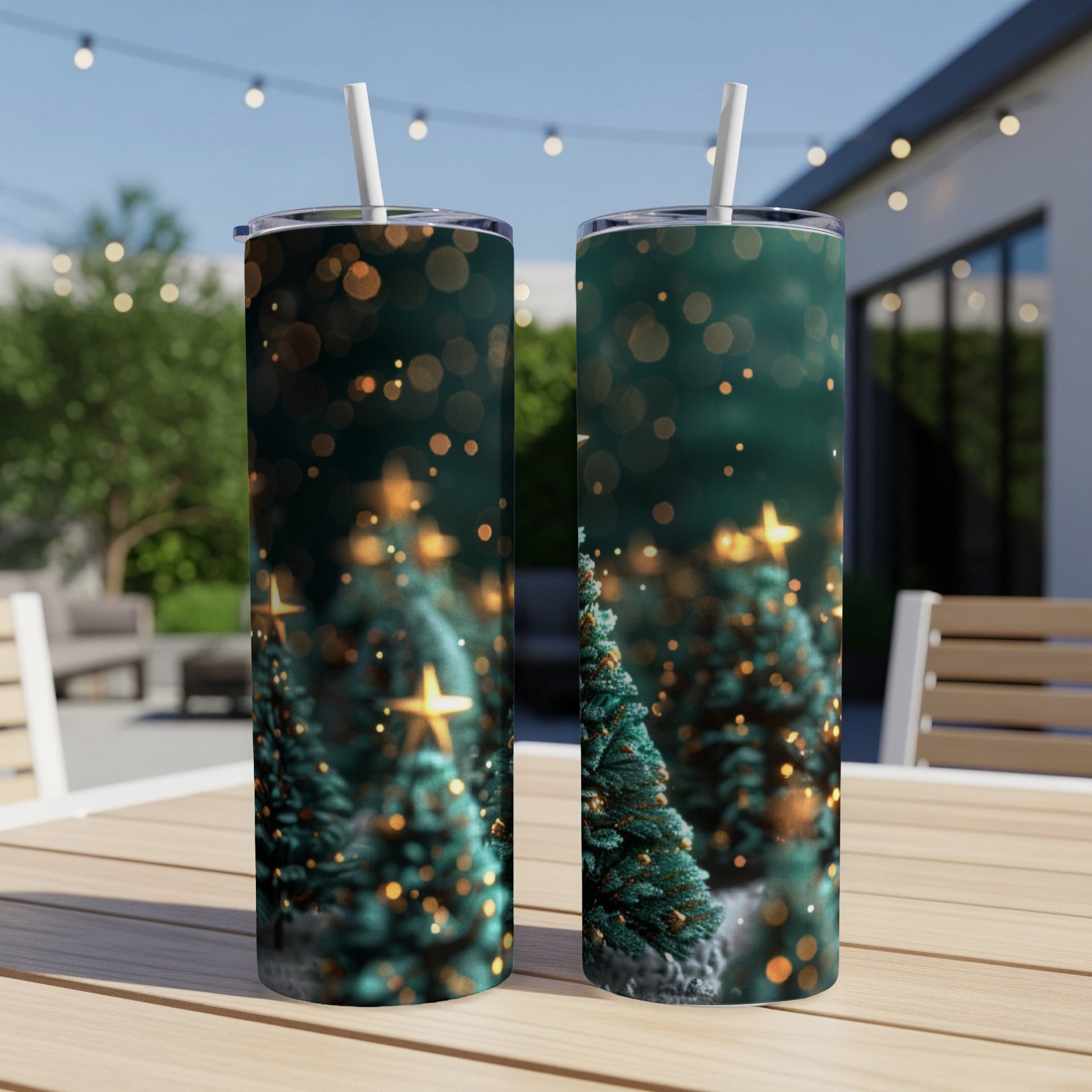 Two tumblers with a dark green Christmas tree and bokeh lights design.