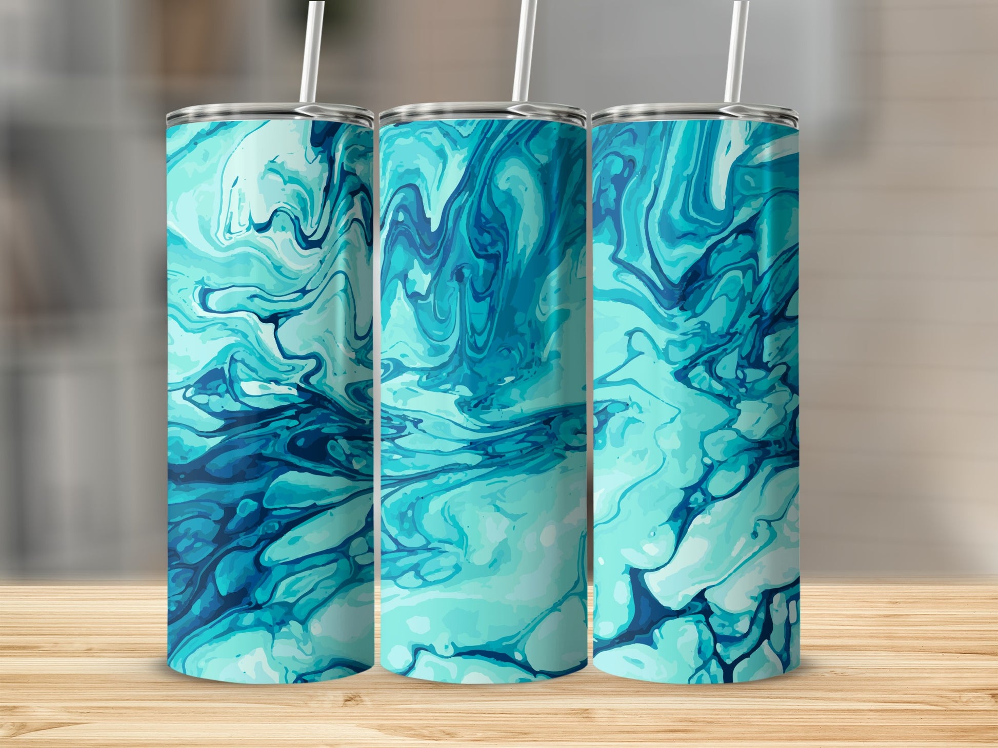 Three tumblers with blue and teal marbled liquid art design.
