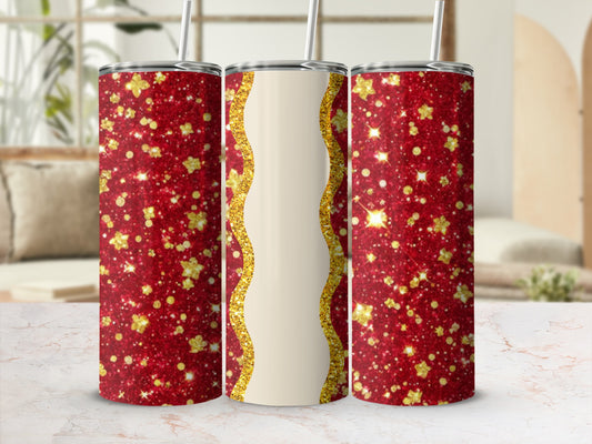 Red glitter tumbler with gold wave detail and straw.