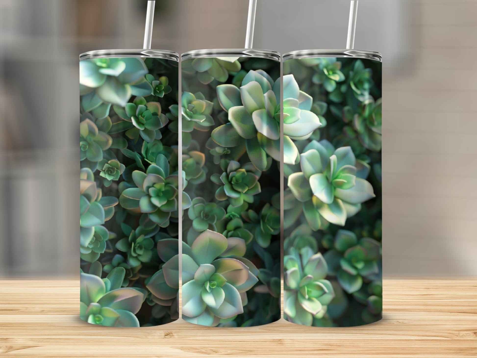 Three tumblers with a close-up pattern of green succulent plants.