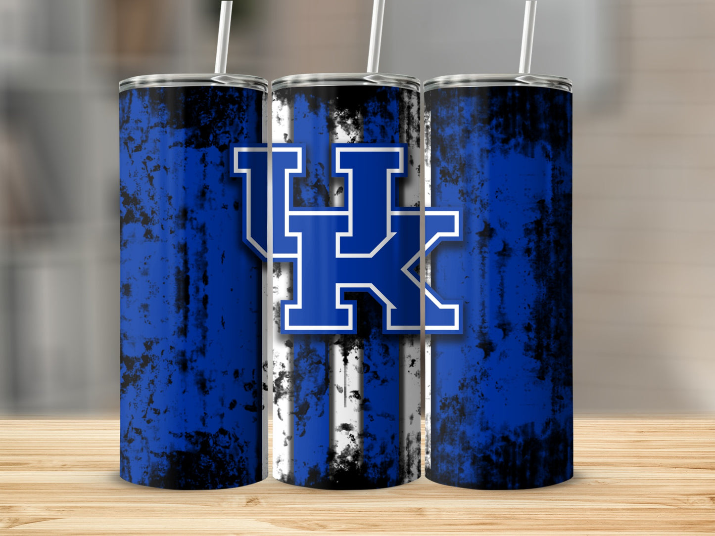 Three tumblers with blue and white stripes and "UK" logo.