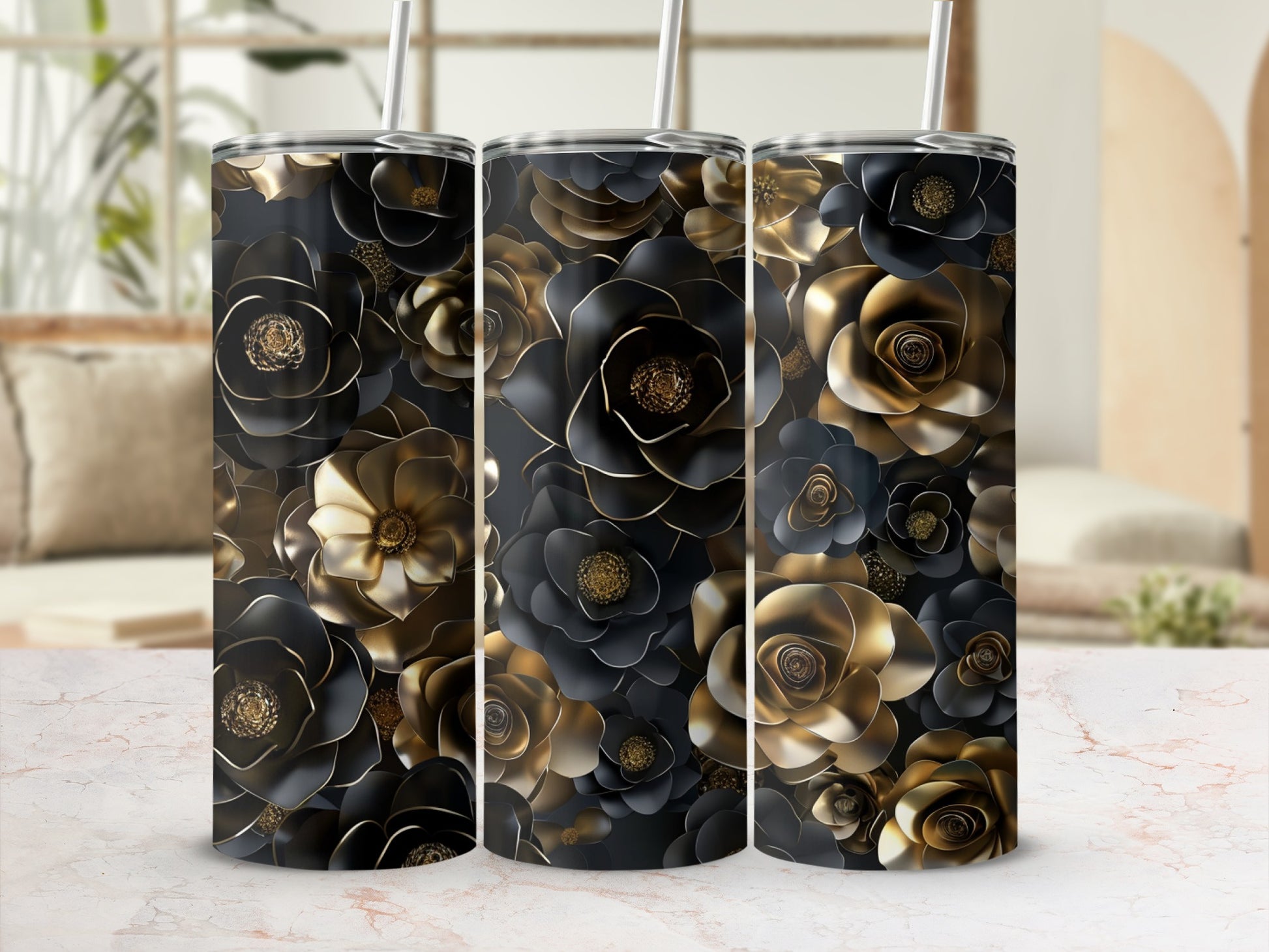 Three tumblers with black and gold floral patterns.