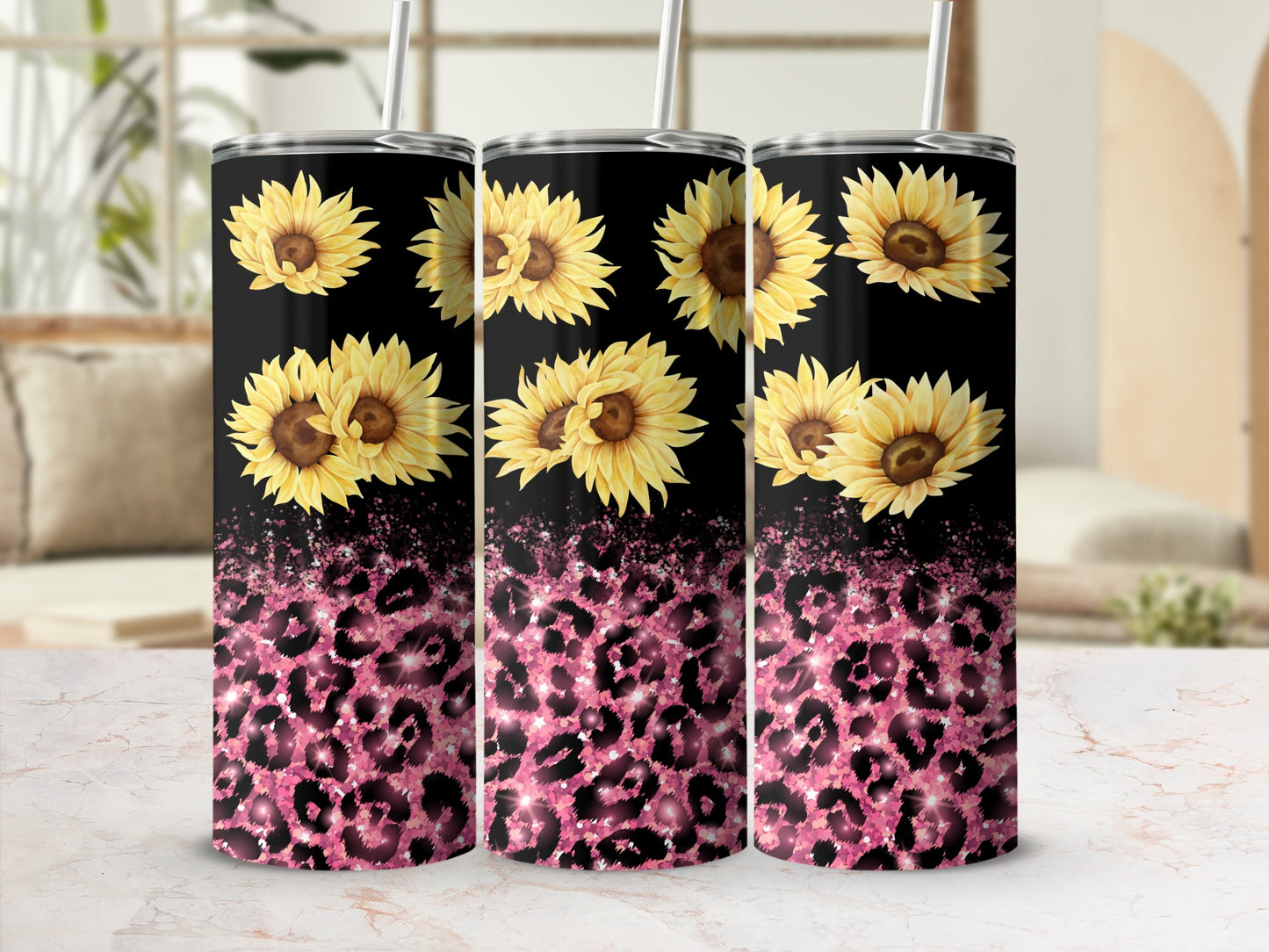 Black tumbler with sunflowers and pink leopard print.