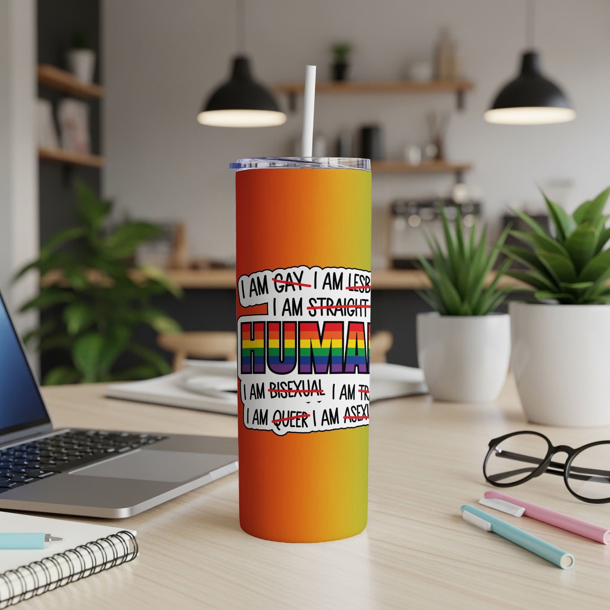 Rainbow tumbler with text: "I am gay, I am lesbian, I am straight, I am bisexual, I am queer, I am asexual."