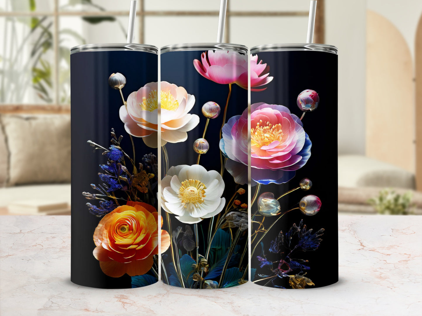 Three tall tumblers adorned with vibrant floral designs.