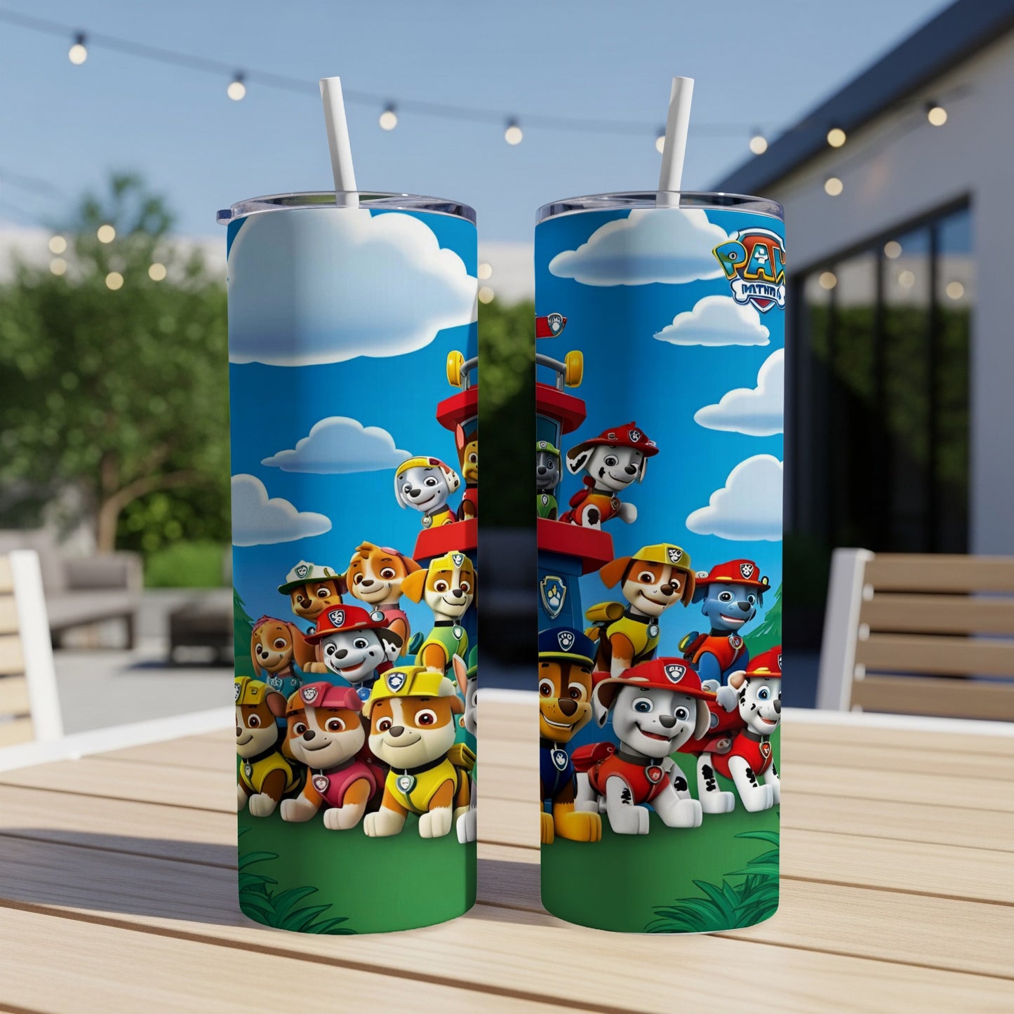 Paw Patrol characters on a blue background with clouds and green grass.