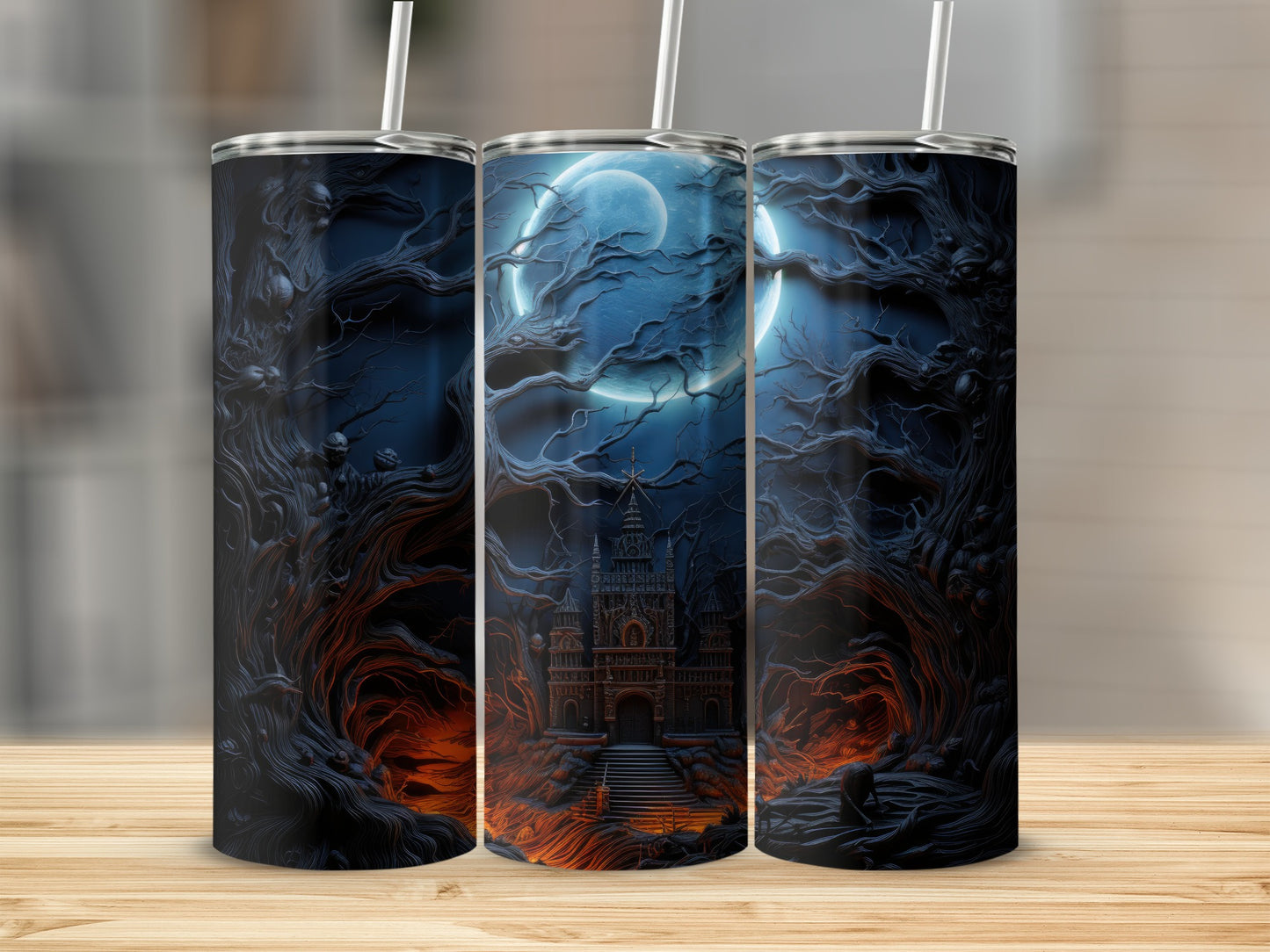Three tumblers with a dark forest and haunted castle design under a large moon.