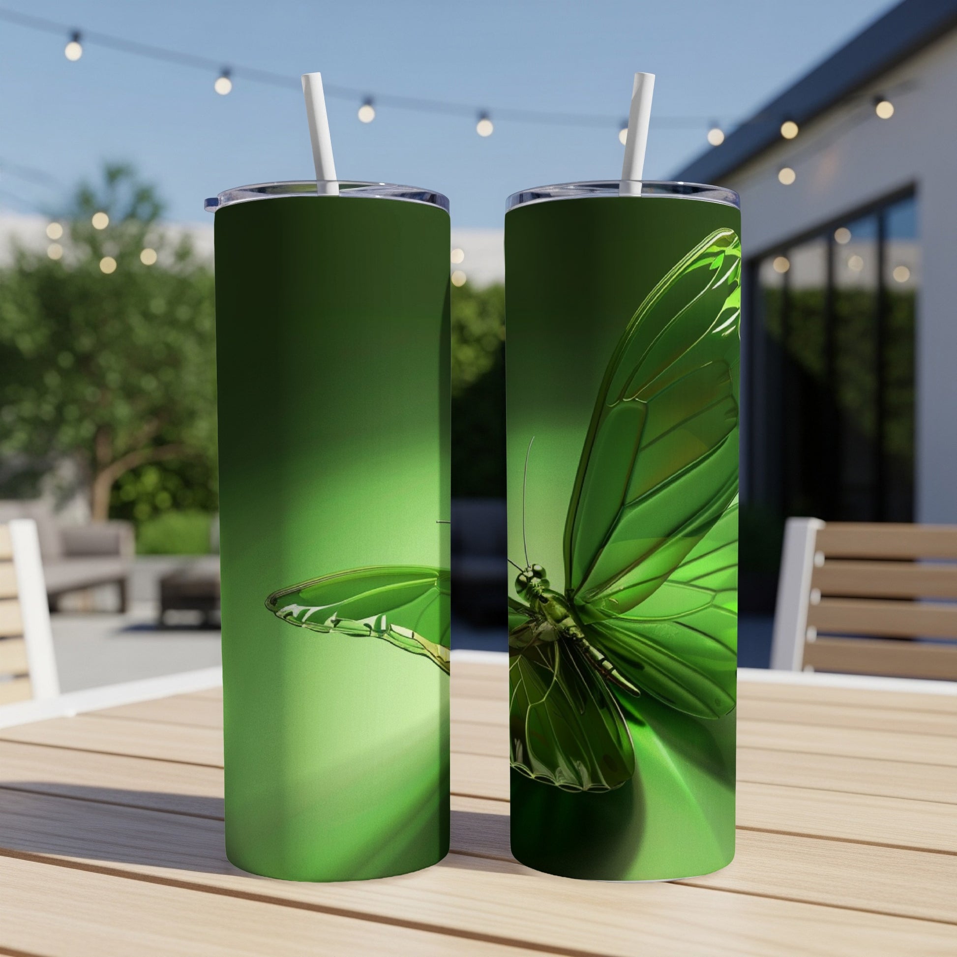 Two green tumblers with a detailed butterfly design.
