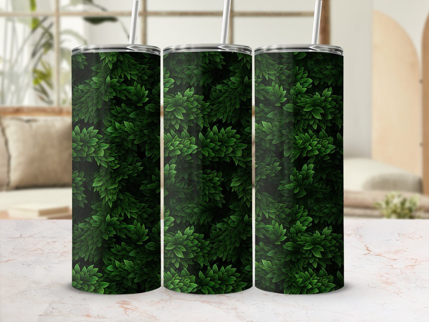 Three tumblers with a repeating pattern of dark green leaves.