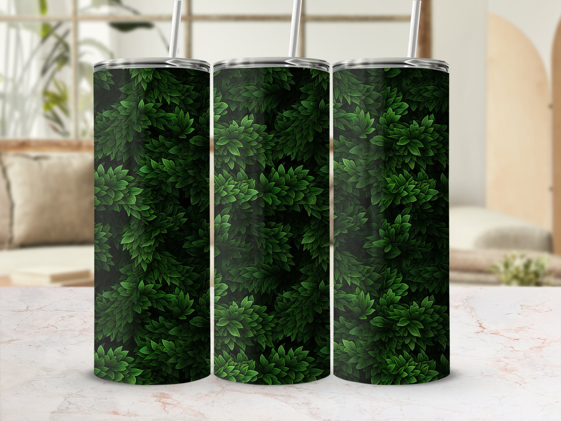 Three tumblers with a repeating pattern of dark green leaves.