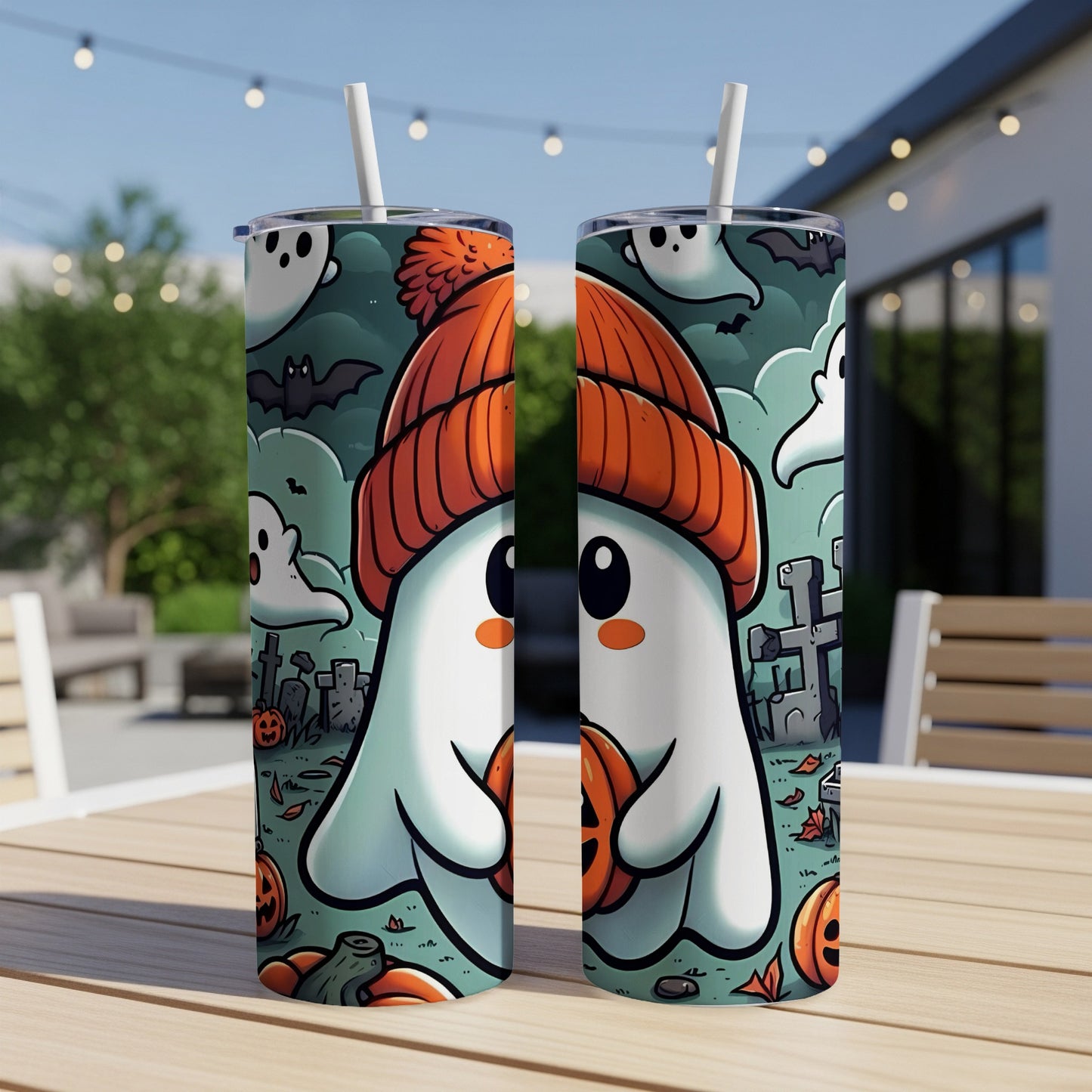 Two tumblers featuring a cartoon ghost wearing an orange beanie and holding a pumpkin.