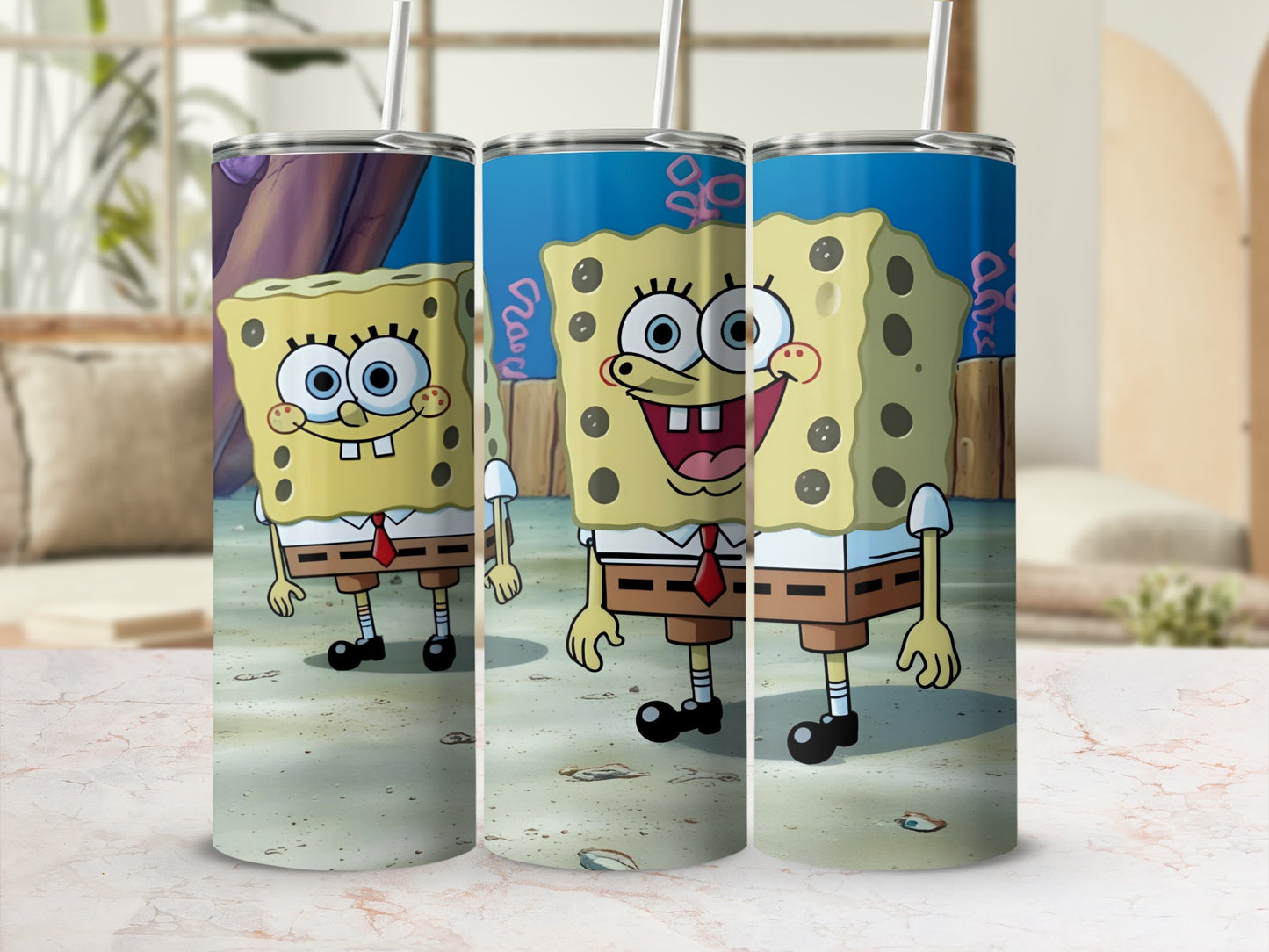 SpongeBob SquarePants characters on a tumbler with a sandy seabed background.